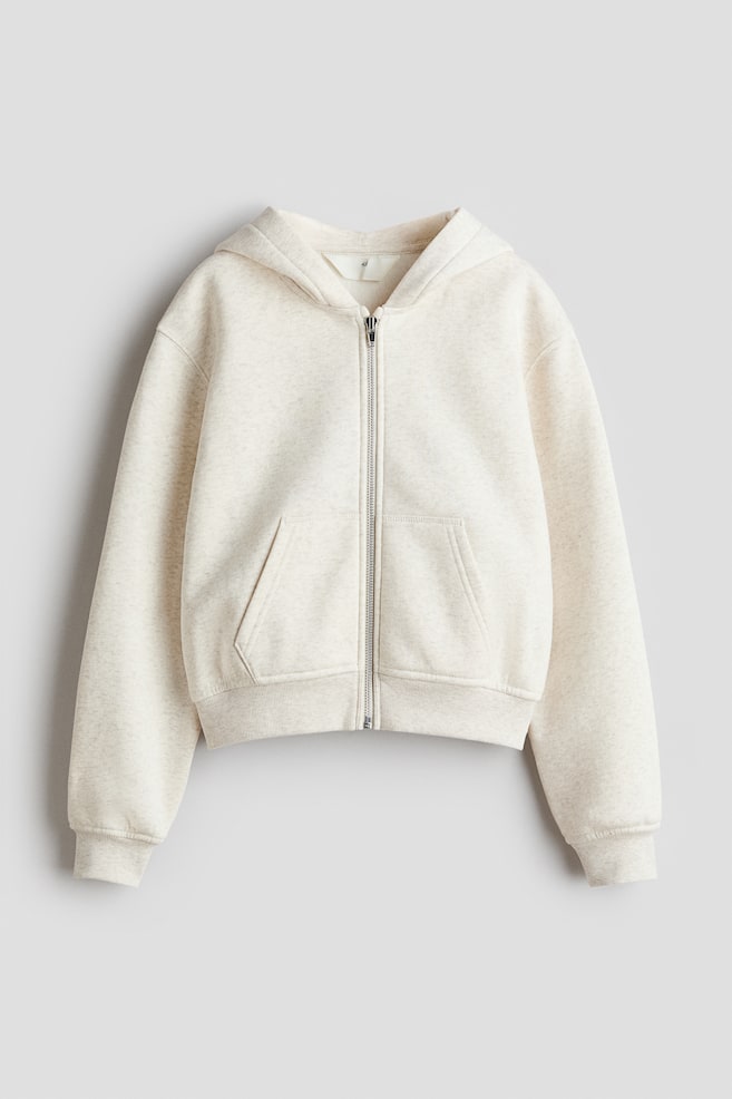 A light beige marl full-zip hoodie is displayed at the front. It features a silver-toned zip, an attached hood, two front patch pockets, and ribbed cuffs and hem. - 1