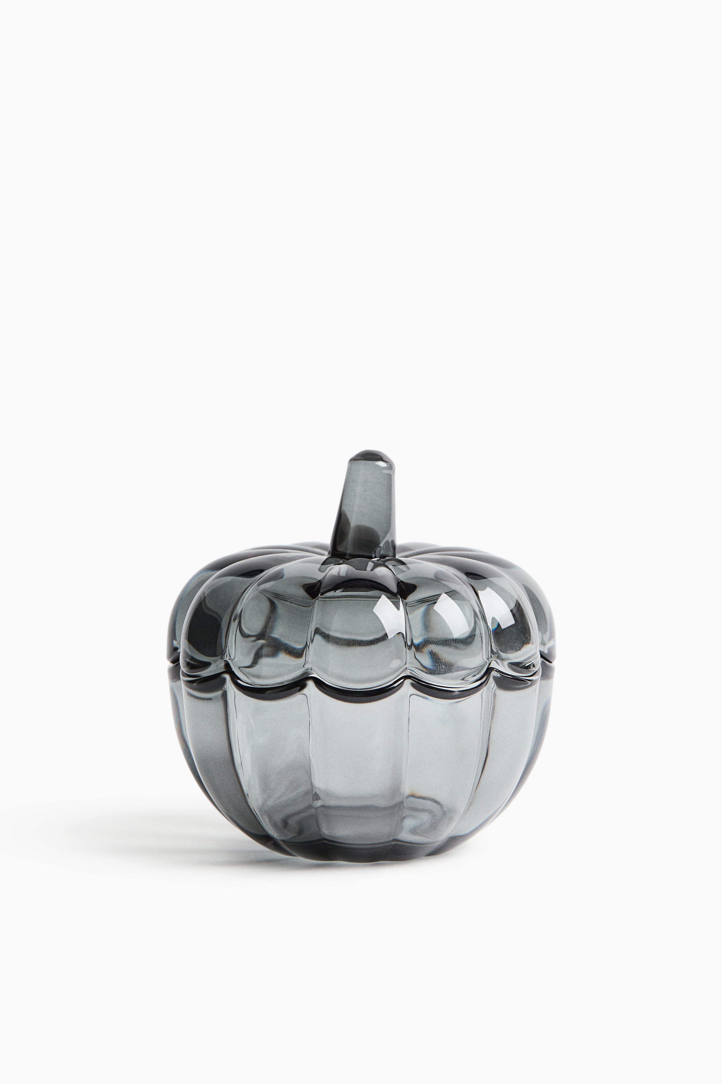 Small pumpkin-shaped glass jar