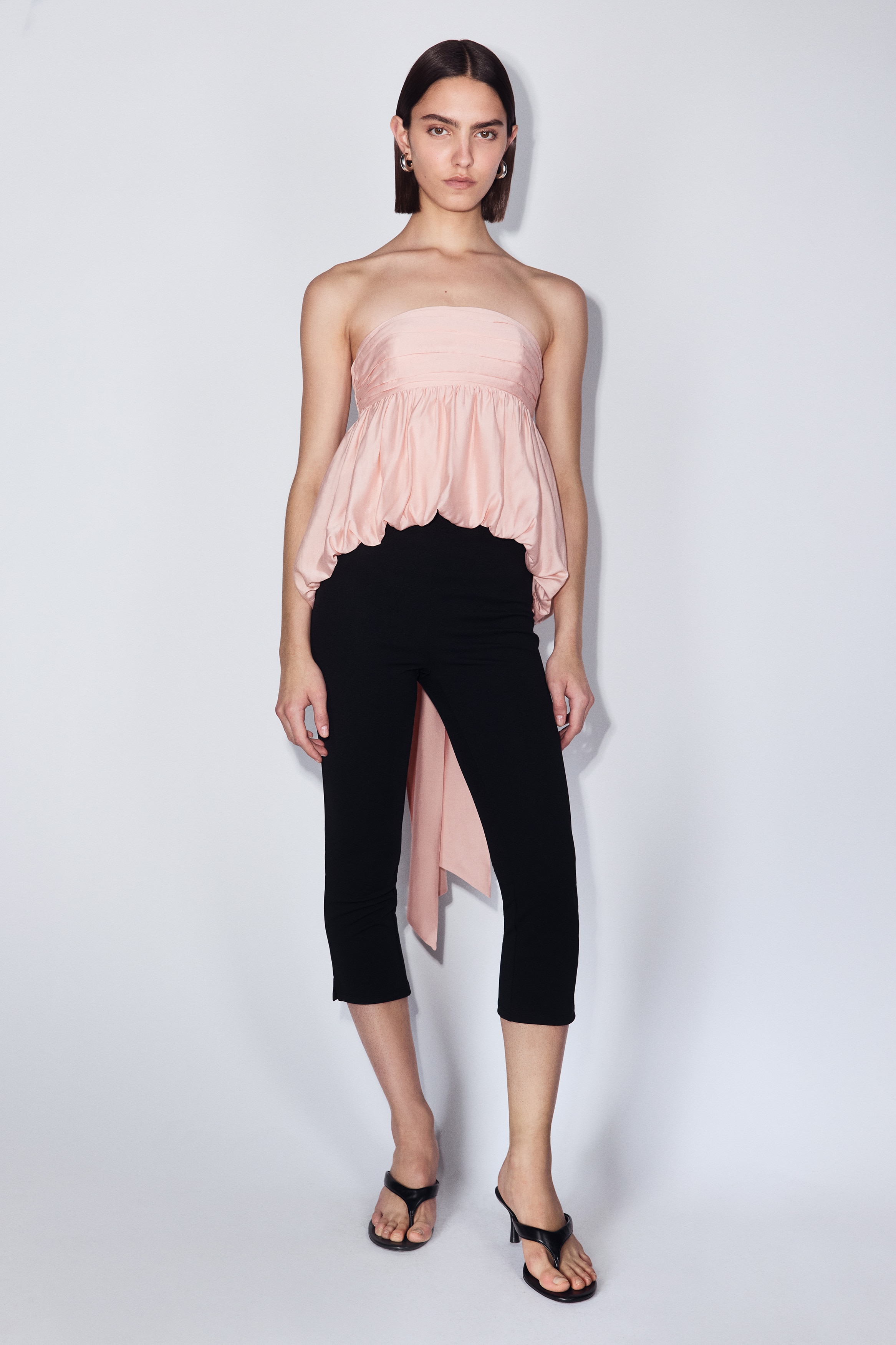 Top a fascia con bordo a palloncinoModal