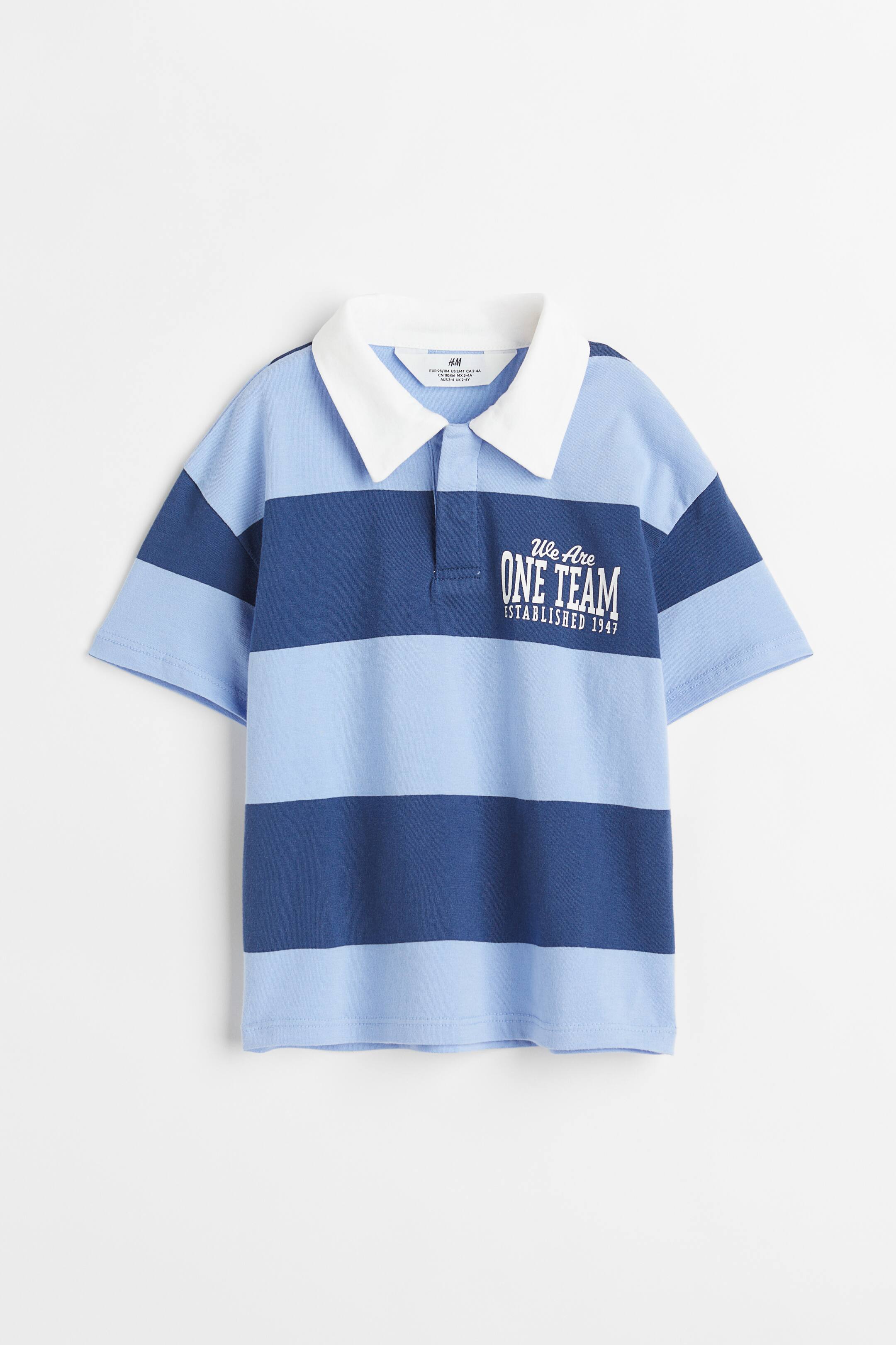 View larger image: Oversized cotton rugby shirt - Blue/We Are One Team - Kids | H&M 1