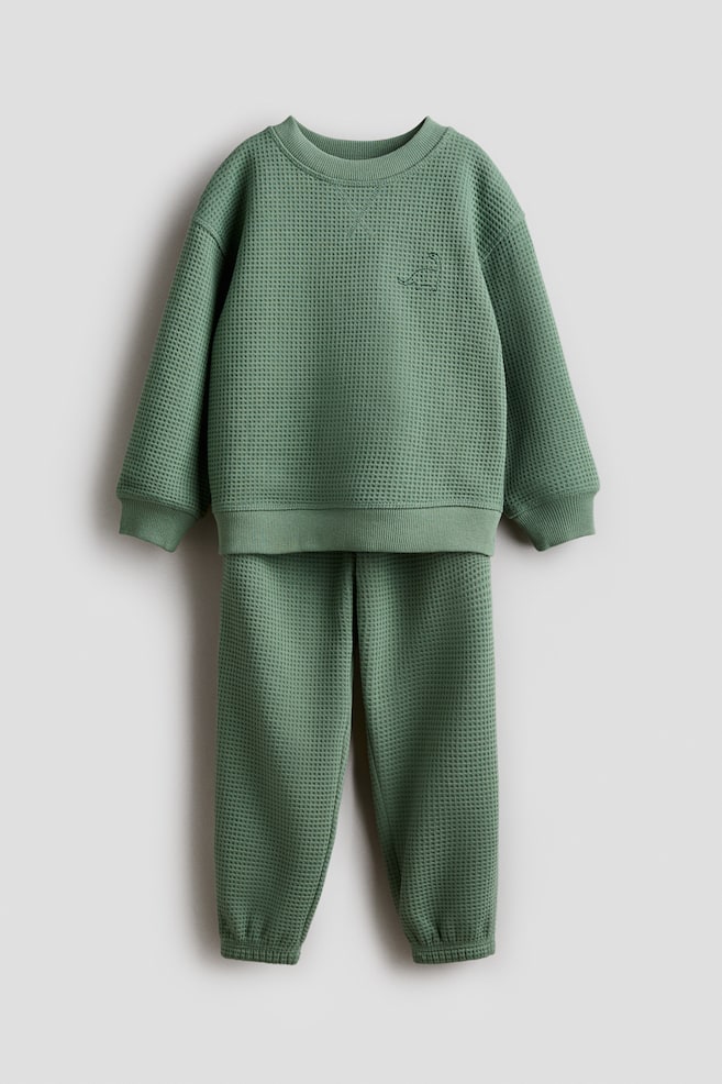 Tweedelige set van wafeltricot met borduursel - Groen/dinosaurus - 1
