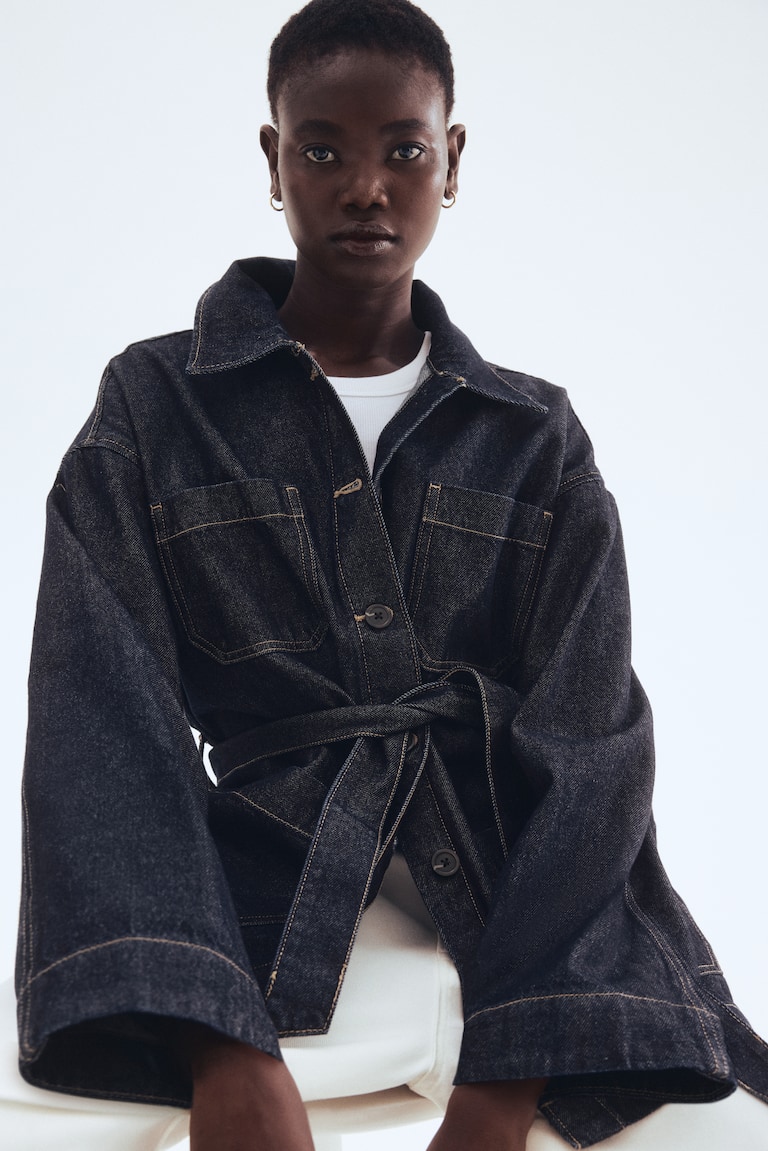 Denim jack met strikceintuur