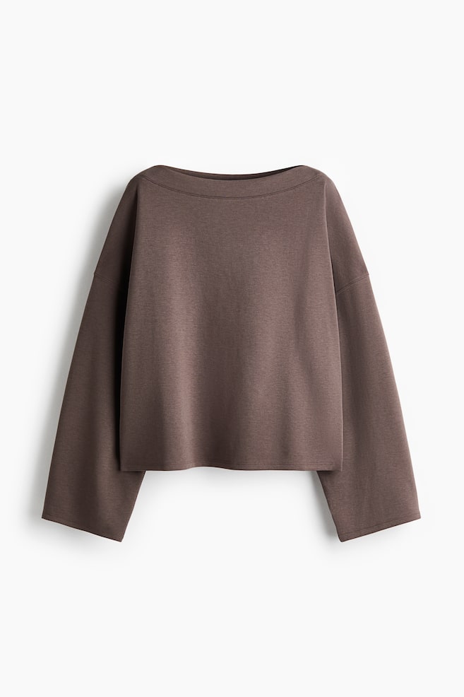 A loose-fit, brown fleece sweatshirt top is shown from the front, featuring a wide boat neckline, low dropped shoulders, and long, wide sleeves. - 1