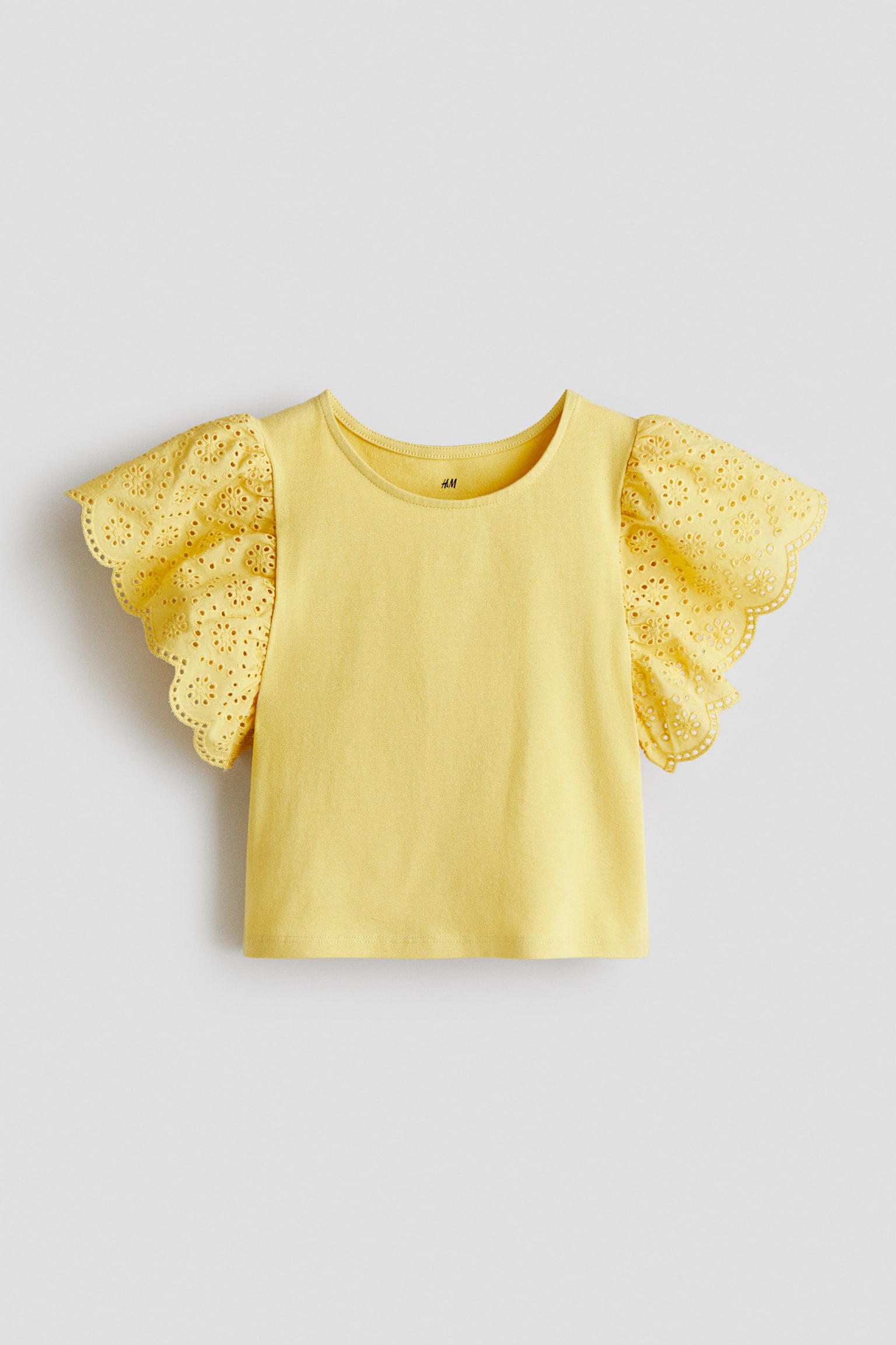 Top met broderie anglaise - Geel
