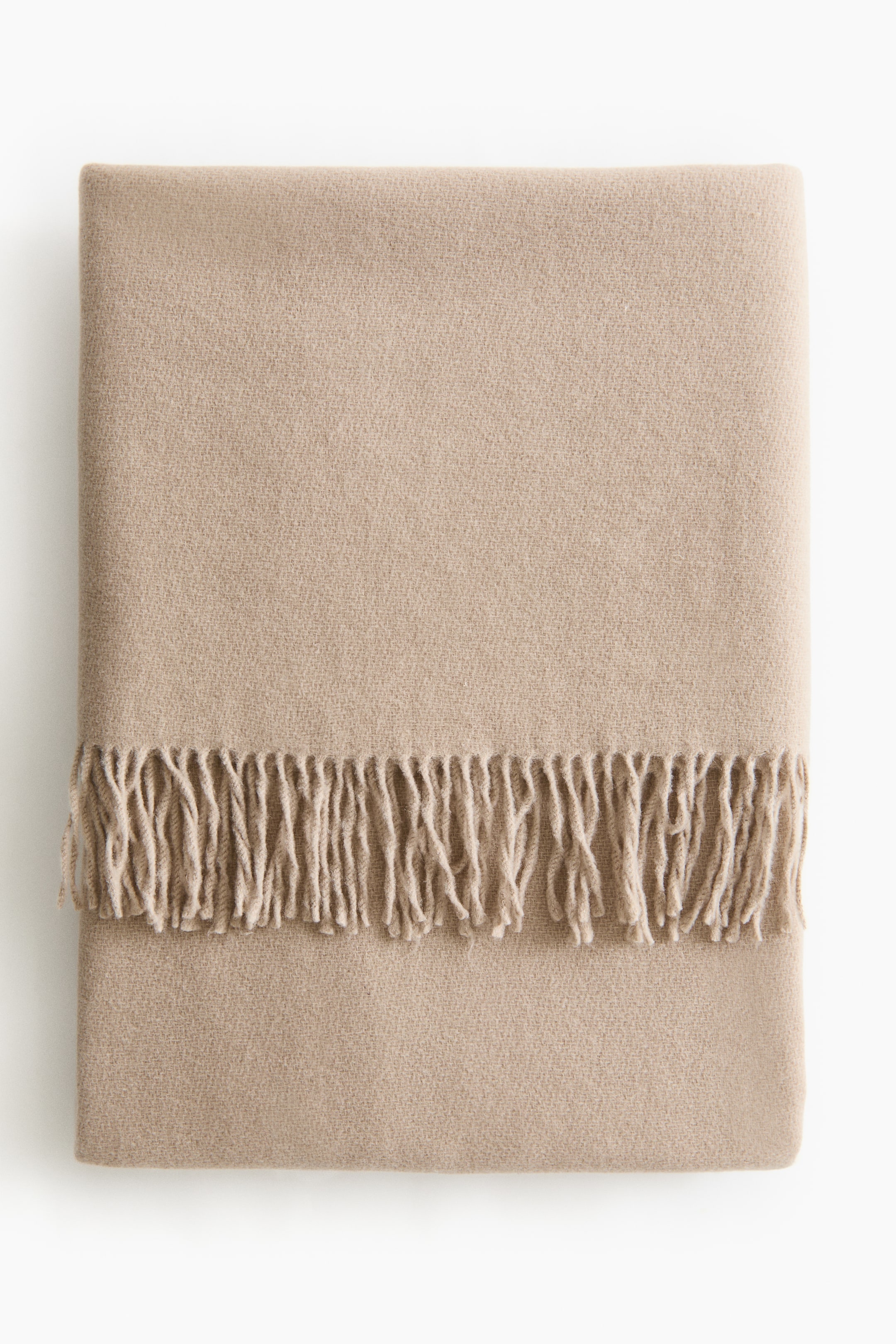 Visualizza immagine più grande: Coperta in misto lana con frange - Beige - HOME | H&M IT 2