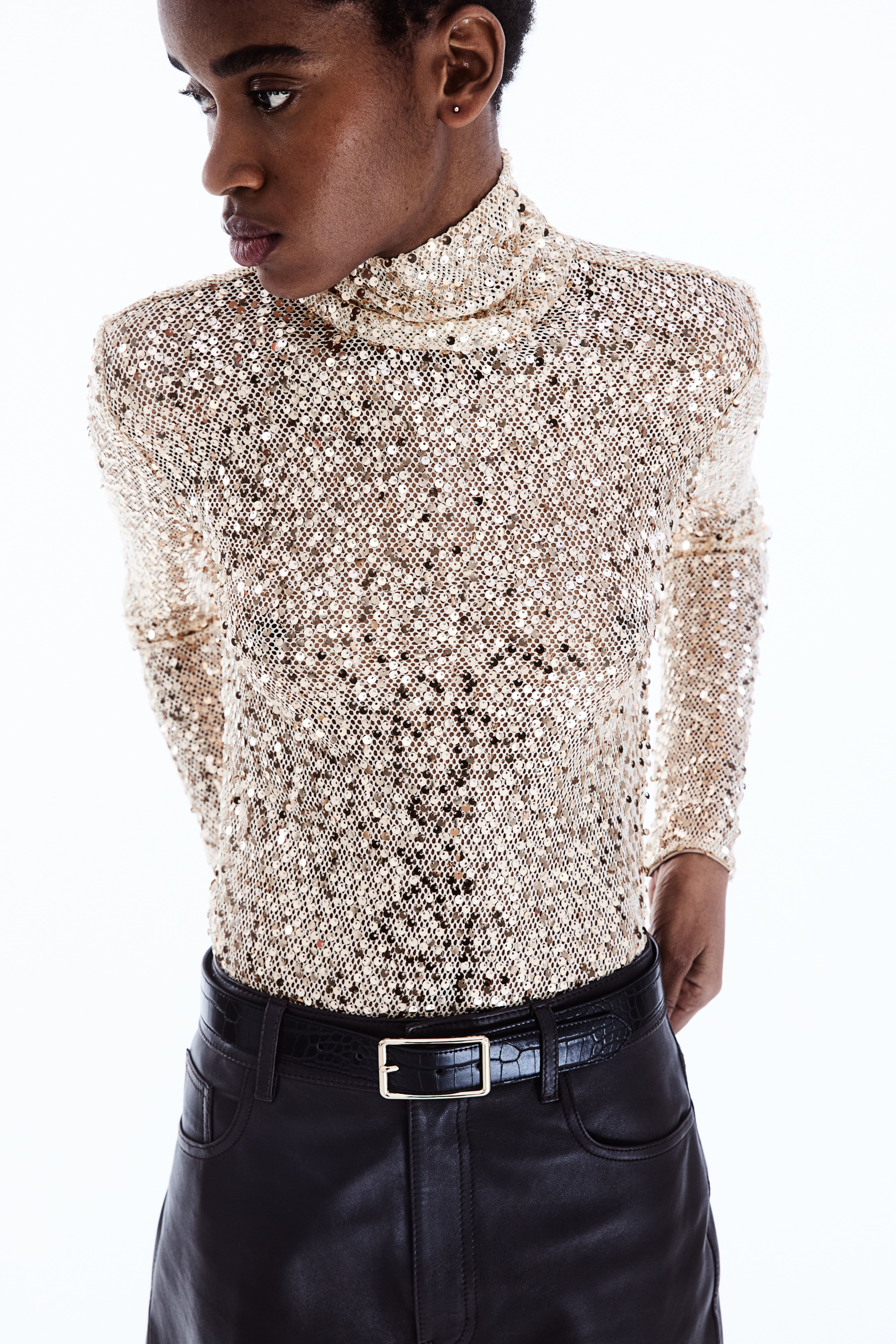 Maglia a lupetto con paillettes Beige chiaro dorato DONNA H M CH