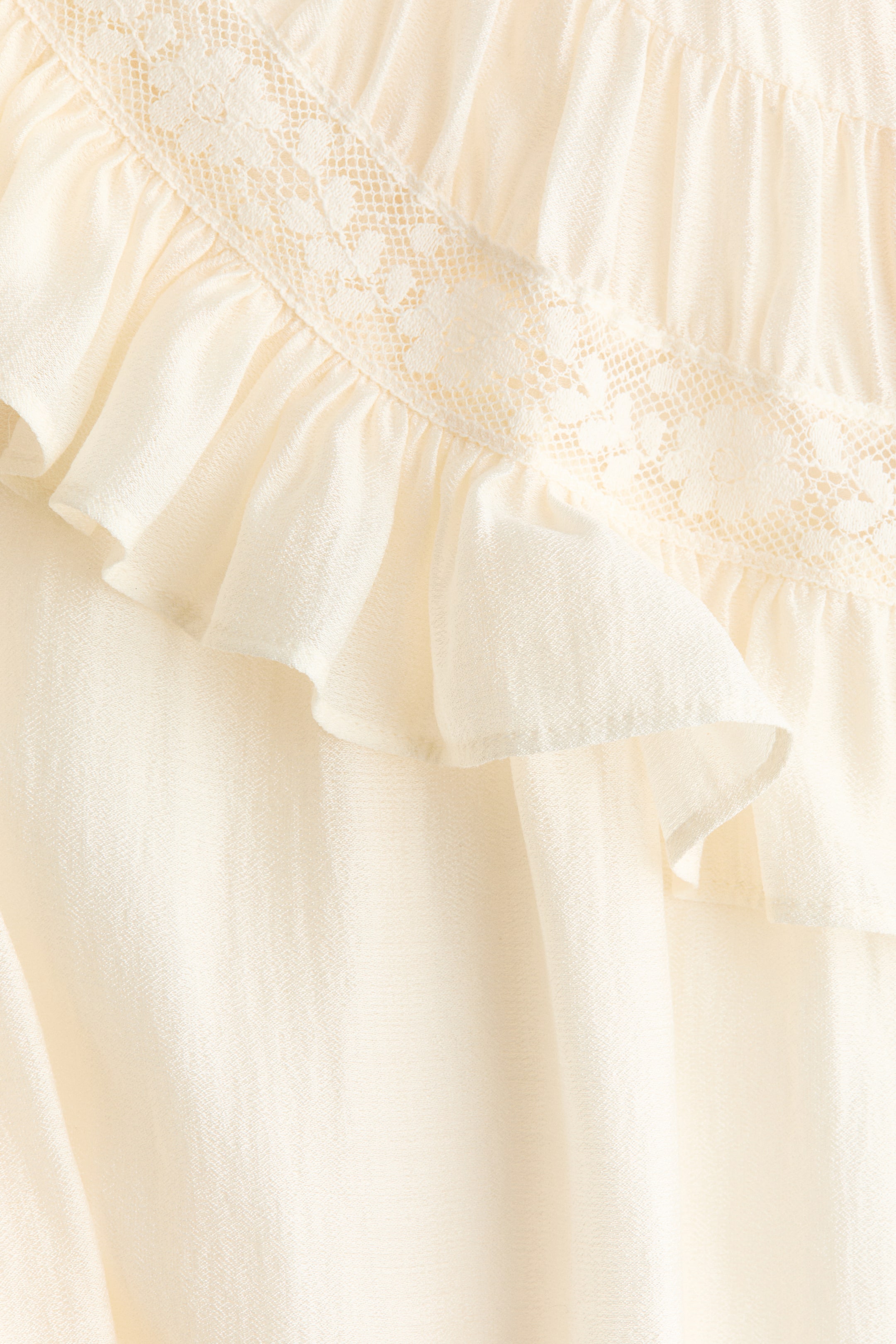 Ruffle-Trimmed Tie-Neck Blouse