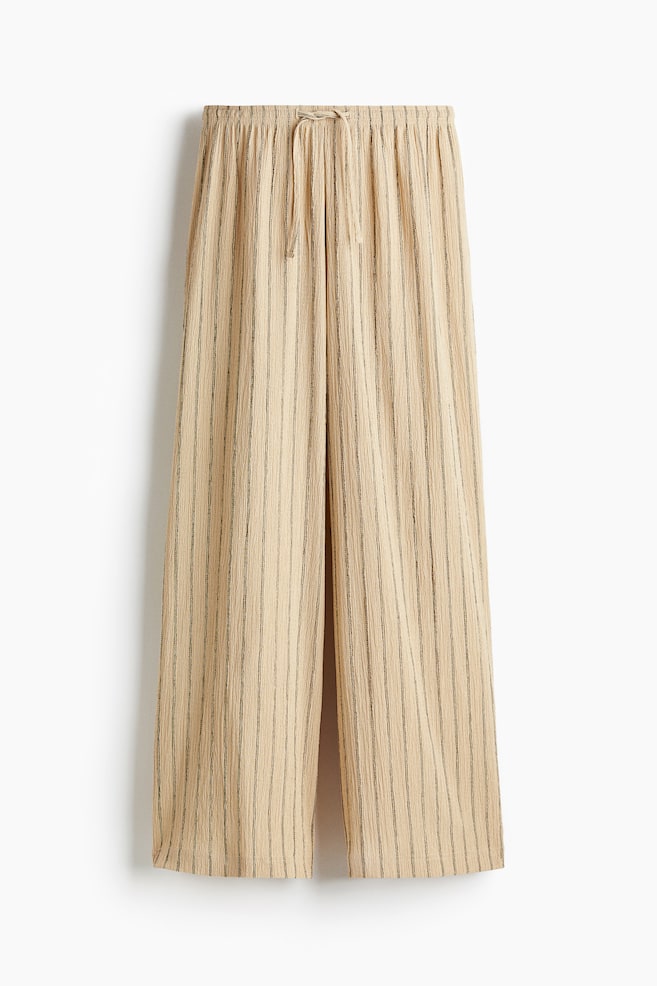 Pantalon large avec taille élastique - Beige/Rose ancien clair/Brun foncé/rayé/Rouge rouille foncé/Brun foncé/imprimé léopard/Brun foncé/Noir - 1