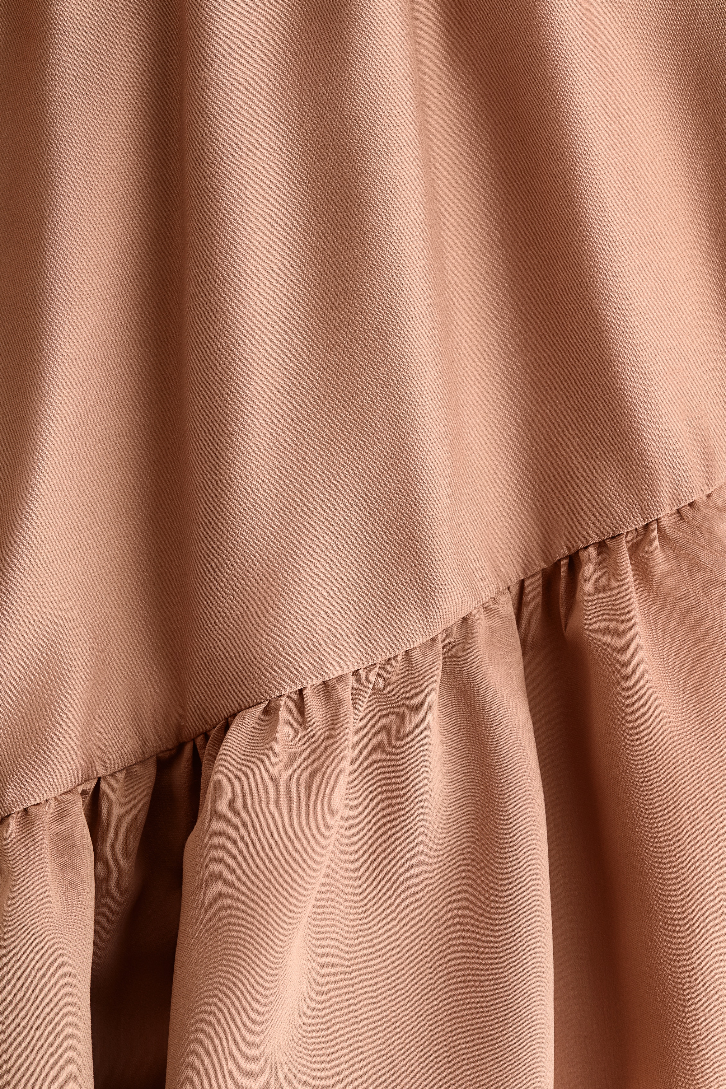 Flounce-trimmed blouse