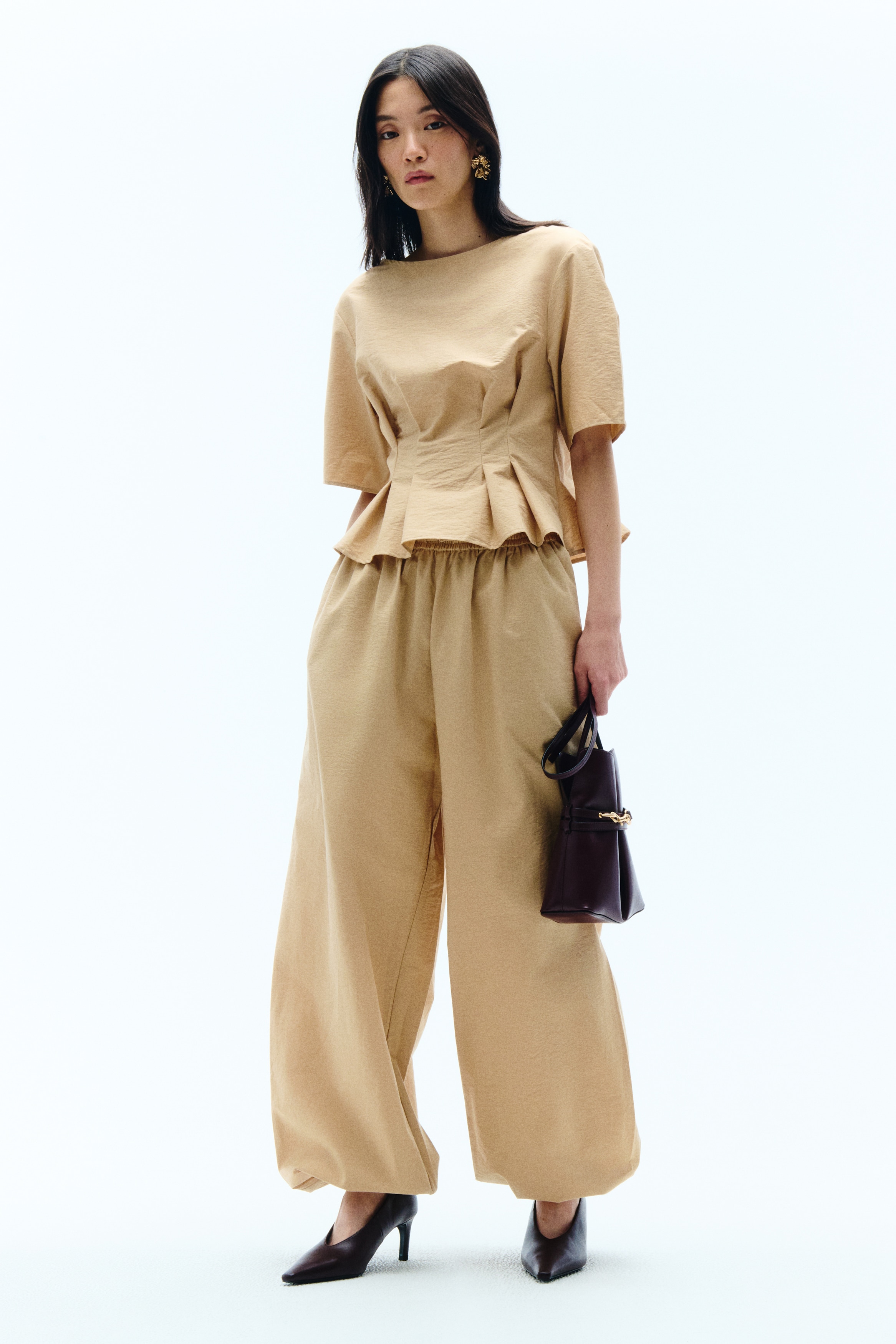 Waisted boat-neck top