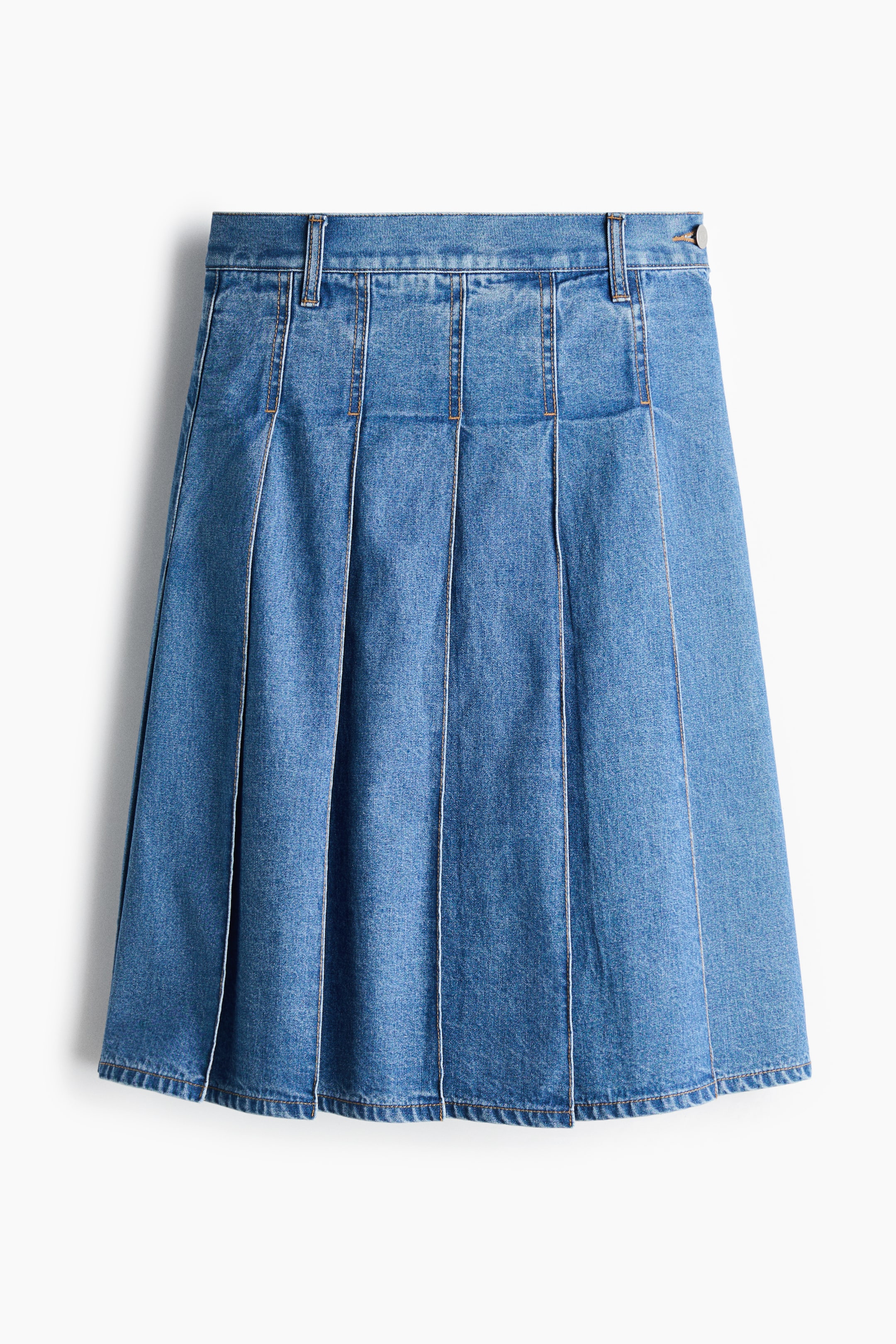 View larger image: A blue denim pleated skirt is facing front, showing off a waistband with belt loops and a button closure. Vertical pleats run down the skirt's body, each accentuated by light-colored contrast stitching.