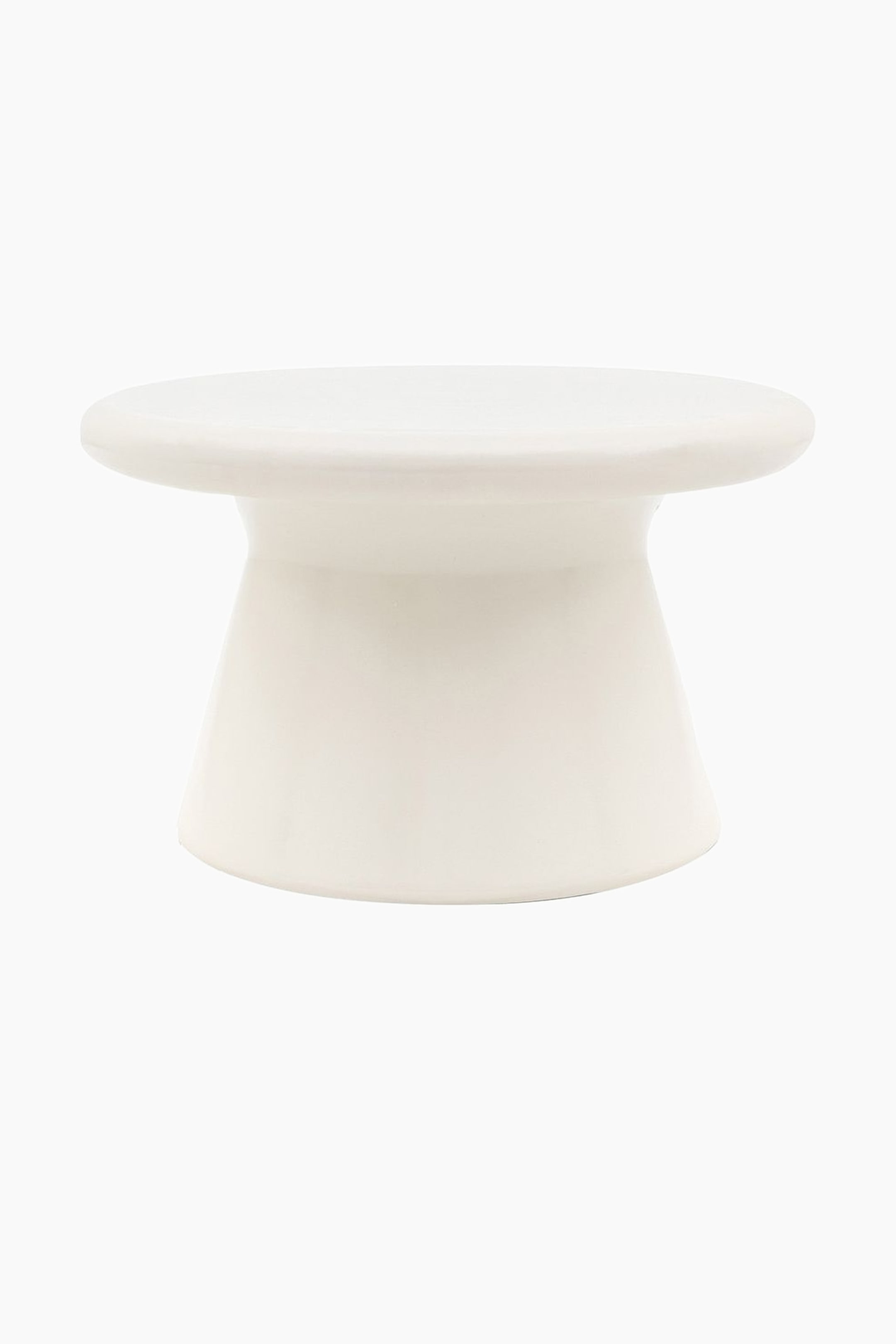 View larger image: A white plinth is facing forward, featuring a flat, circular top resting on a narrower, flared cylindrical support that broadens into a wider base.