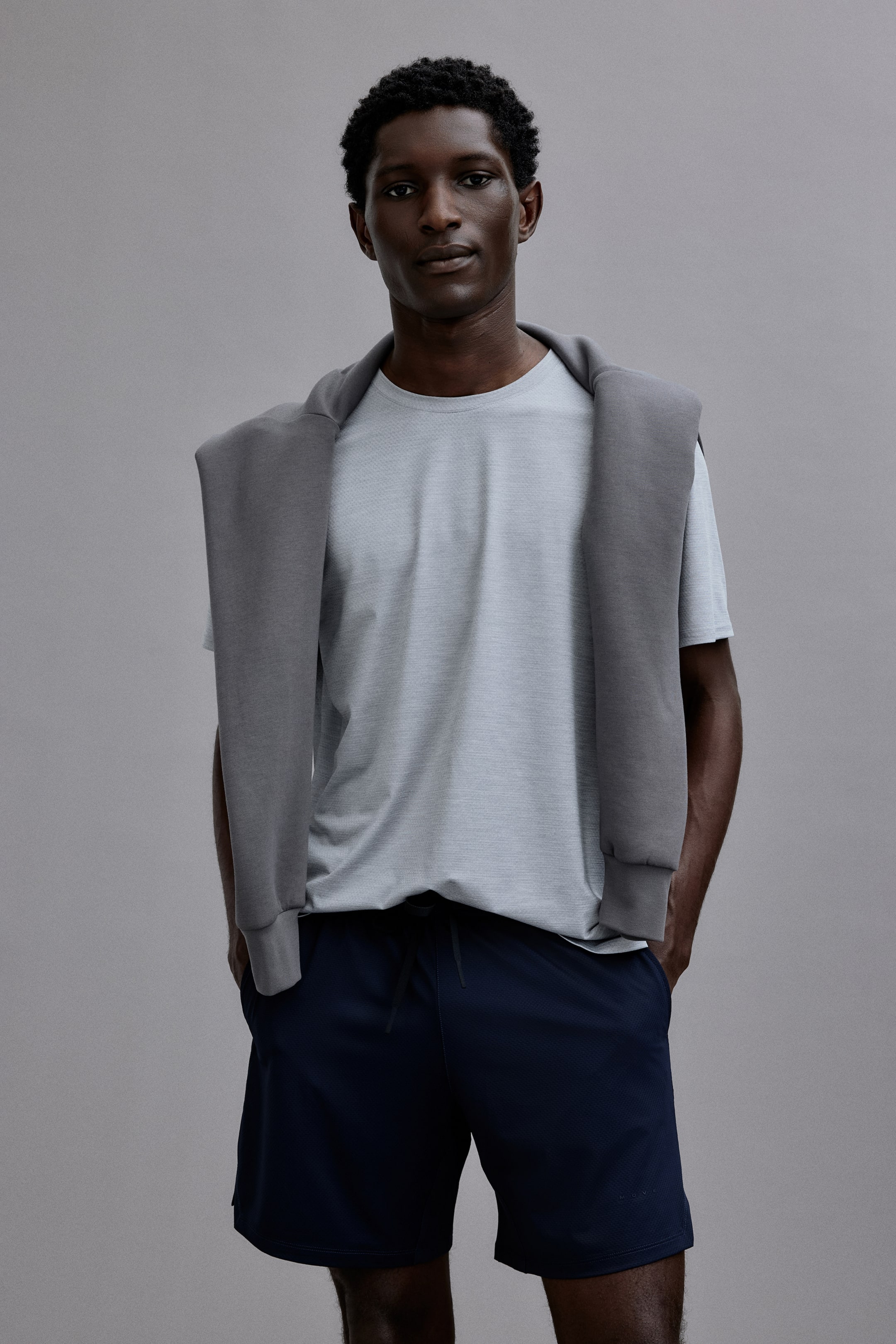 Zobrazit větší obrázek: Sportovní šortky DryMove™ - Námořnická modř - MUŽI | H&M CZ 1