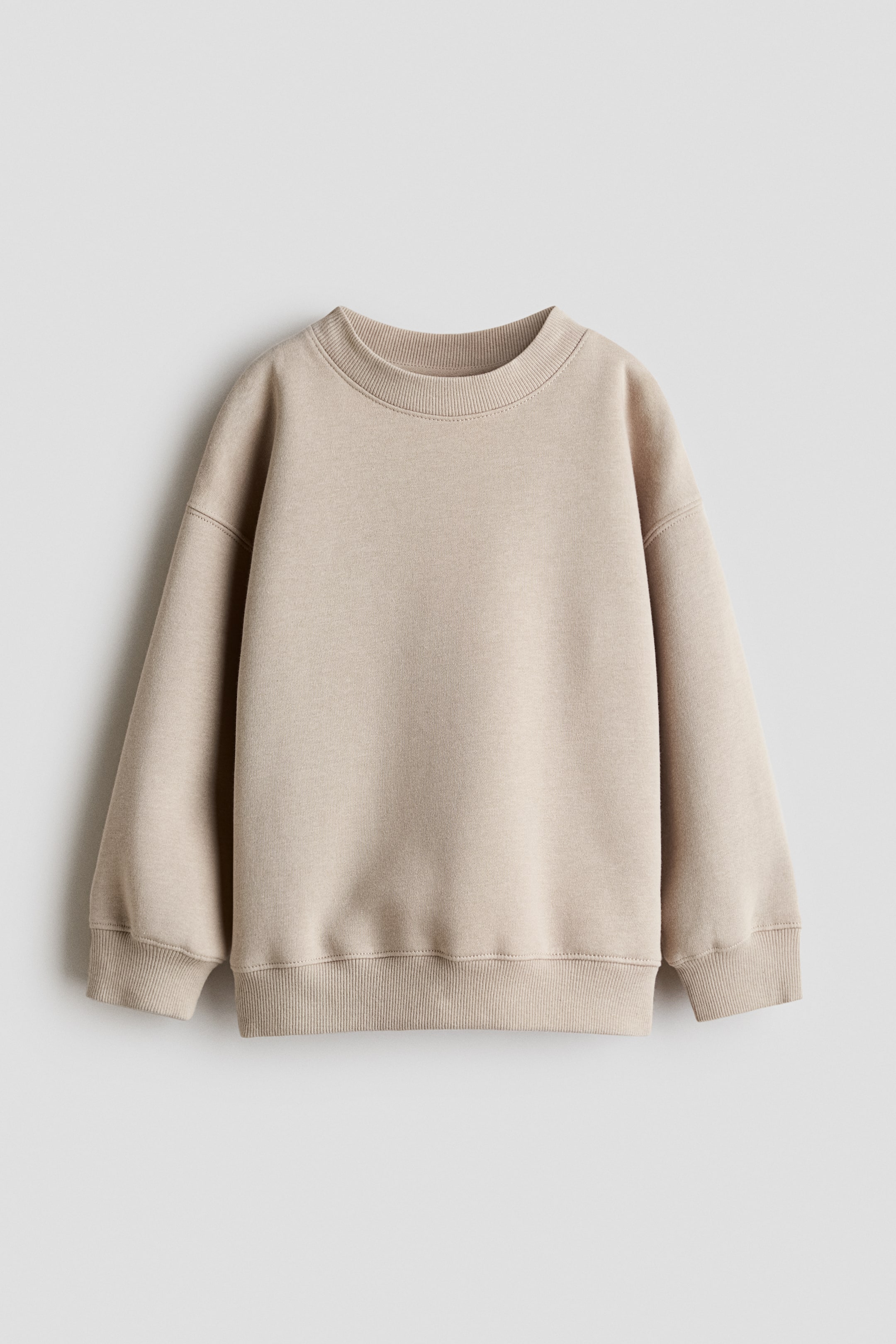 View larger image: Brushed-inside sweatshirt - Light beige - Kids | H&M 1