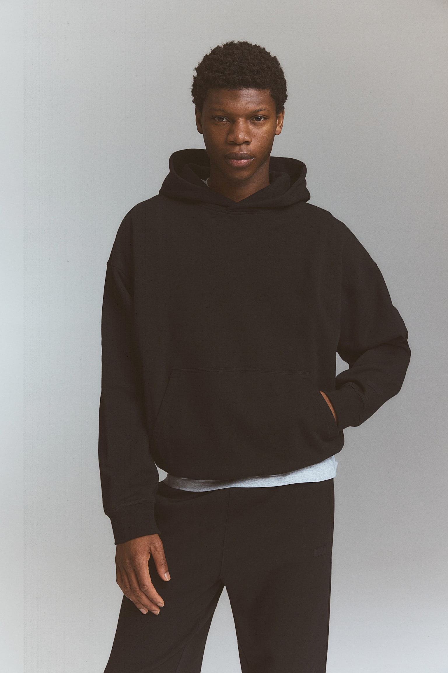 DryMove™ Loose Fit Training hoodie - Black - 1