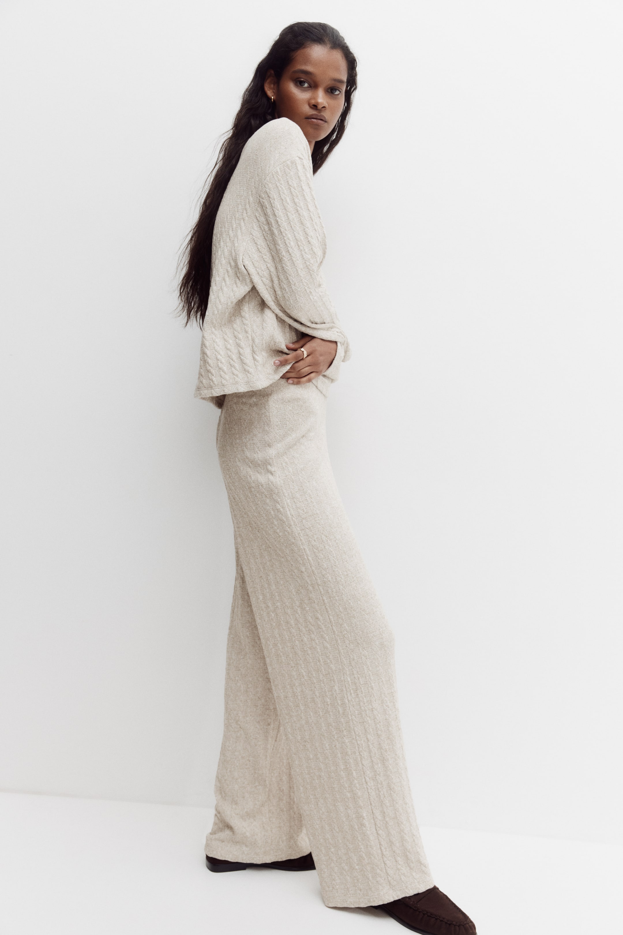 Ingrandisci l'immagine: Pantaloni svasati in maglia a trecce - Beige chiaro mélange - DONNA | H&M CH 1