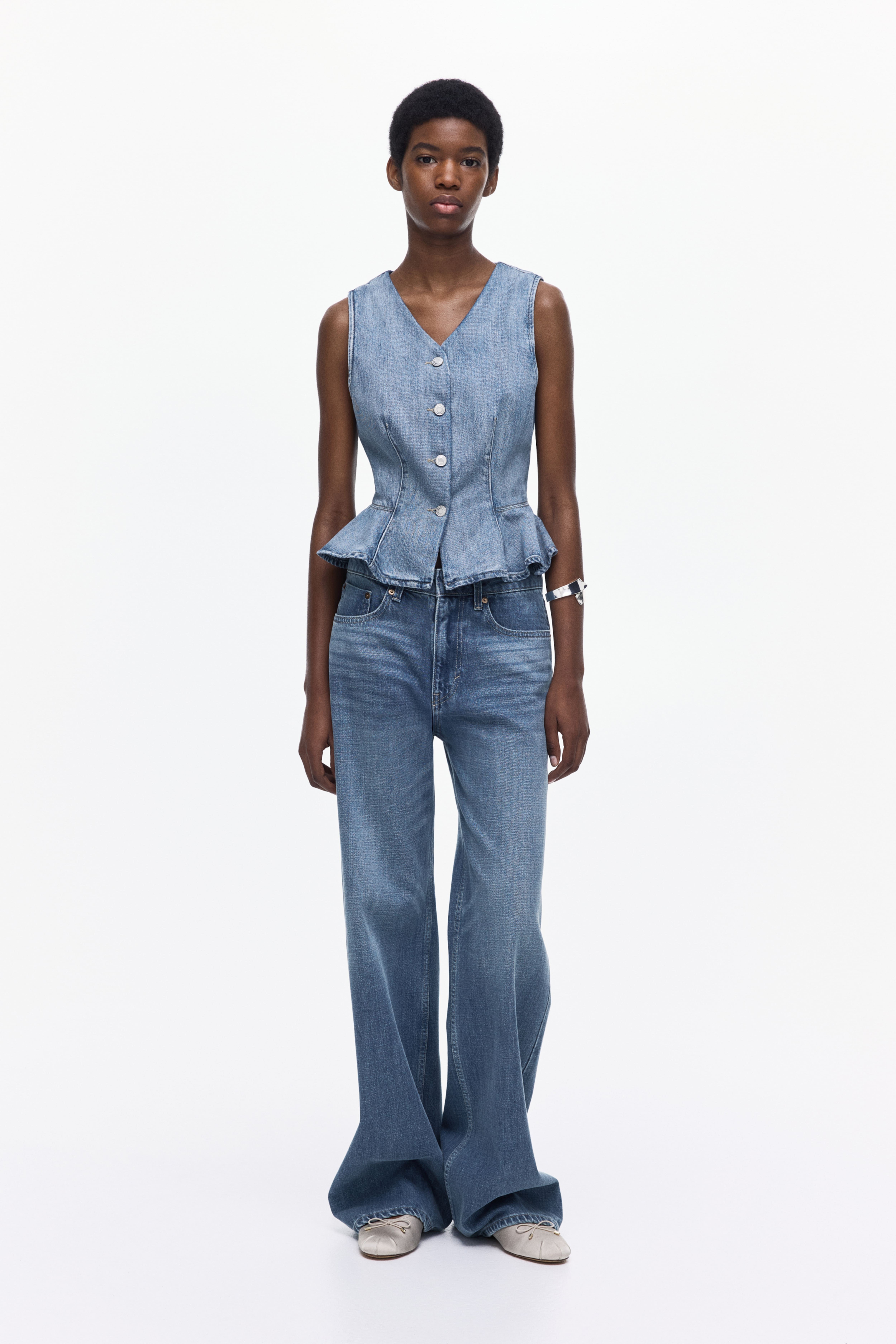 Gilet sans manches en denim avec basque