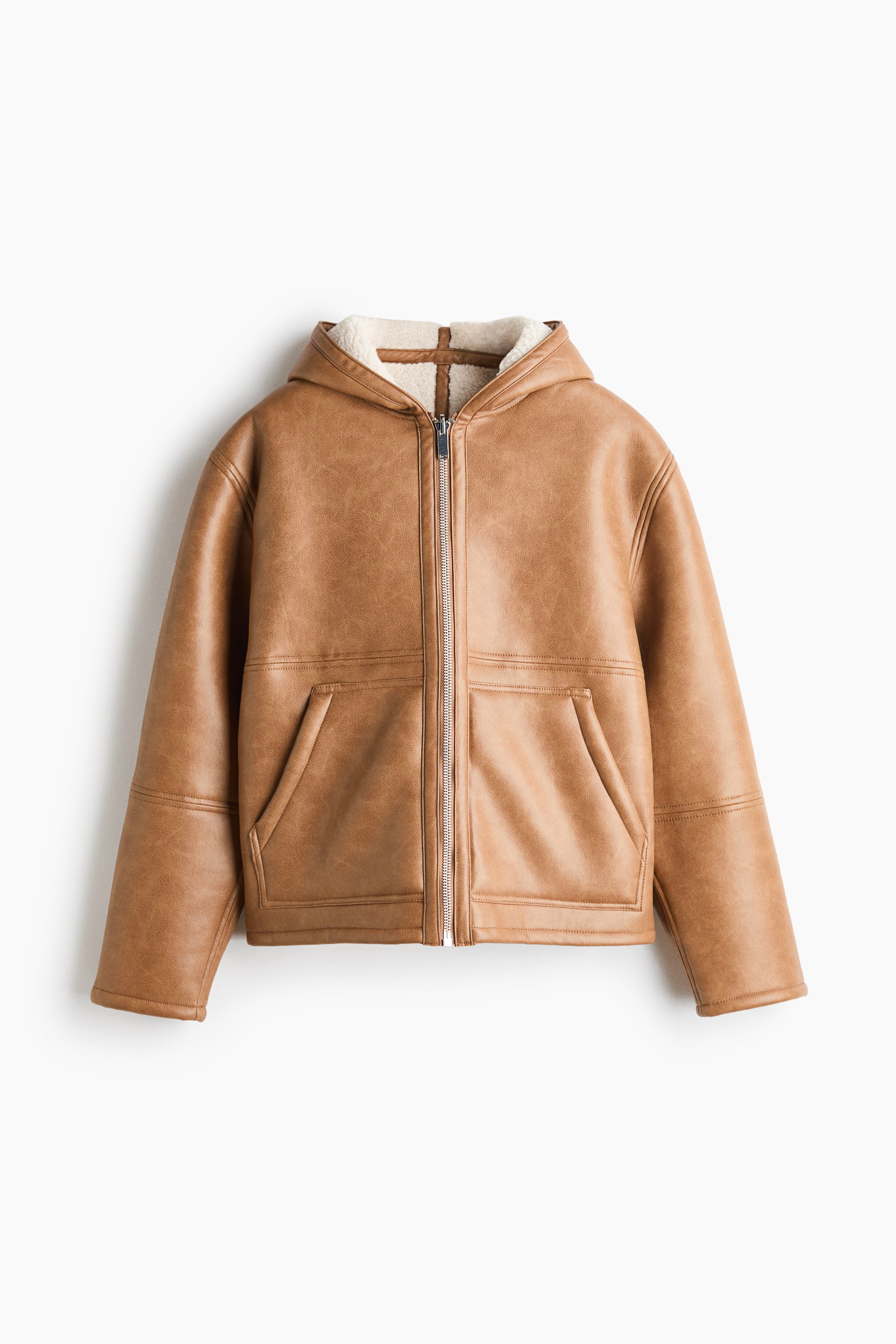 View larger image: A tan faux-leather hooded jacket is shown front-facing, featuring a cream-coloured faux-shearling lining visible inside the hood. The jacket features a silver-tone front zip closure, long sleeves, and two angled front slip pockets.