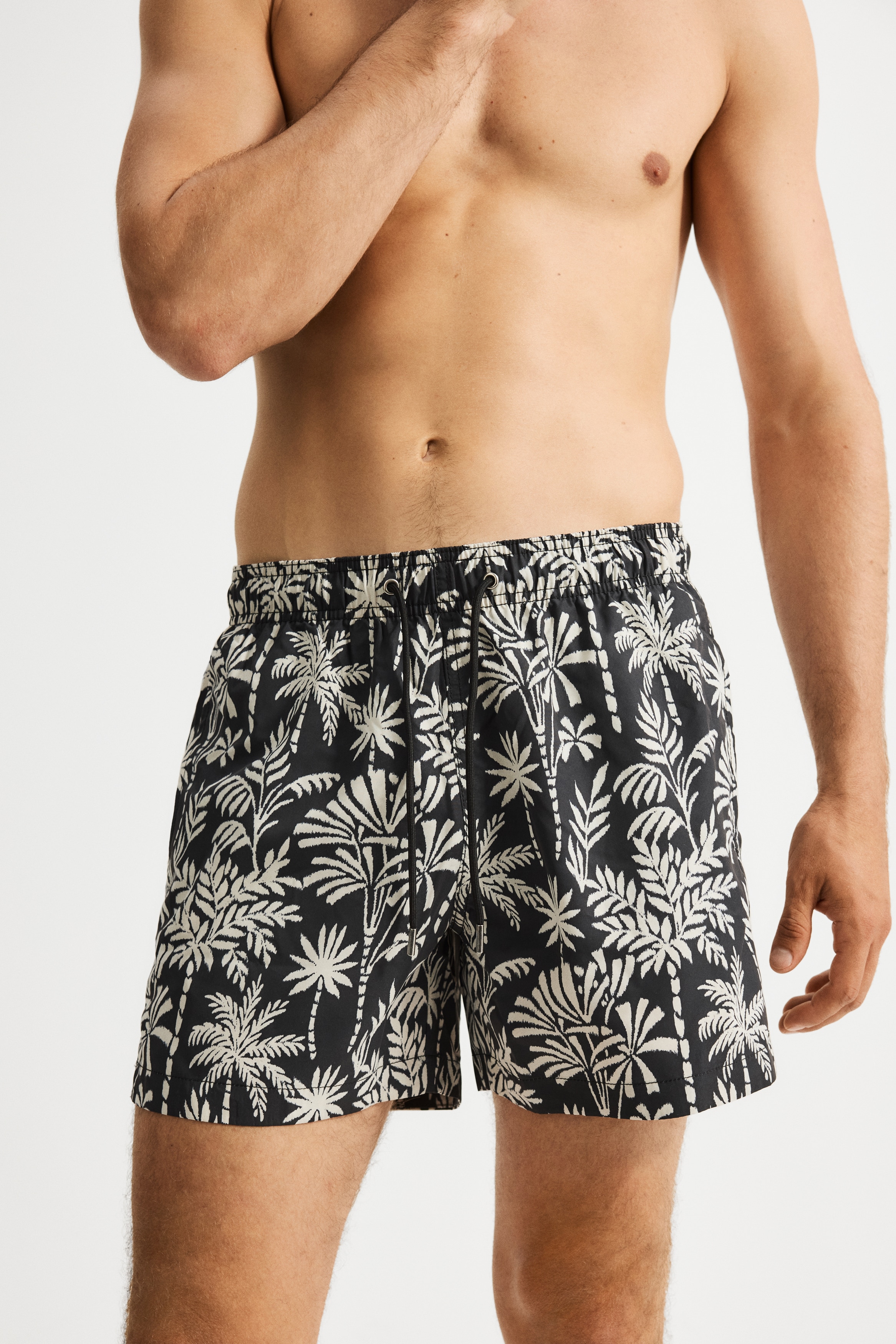 Patterned swim shorts