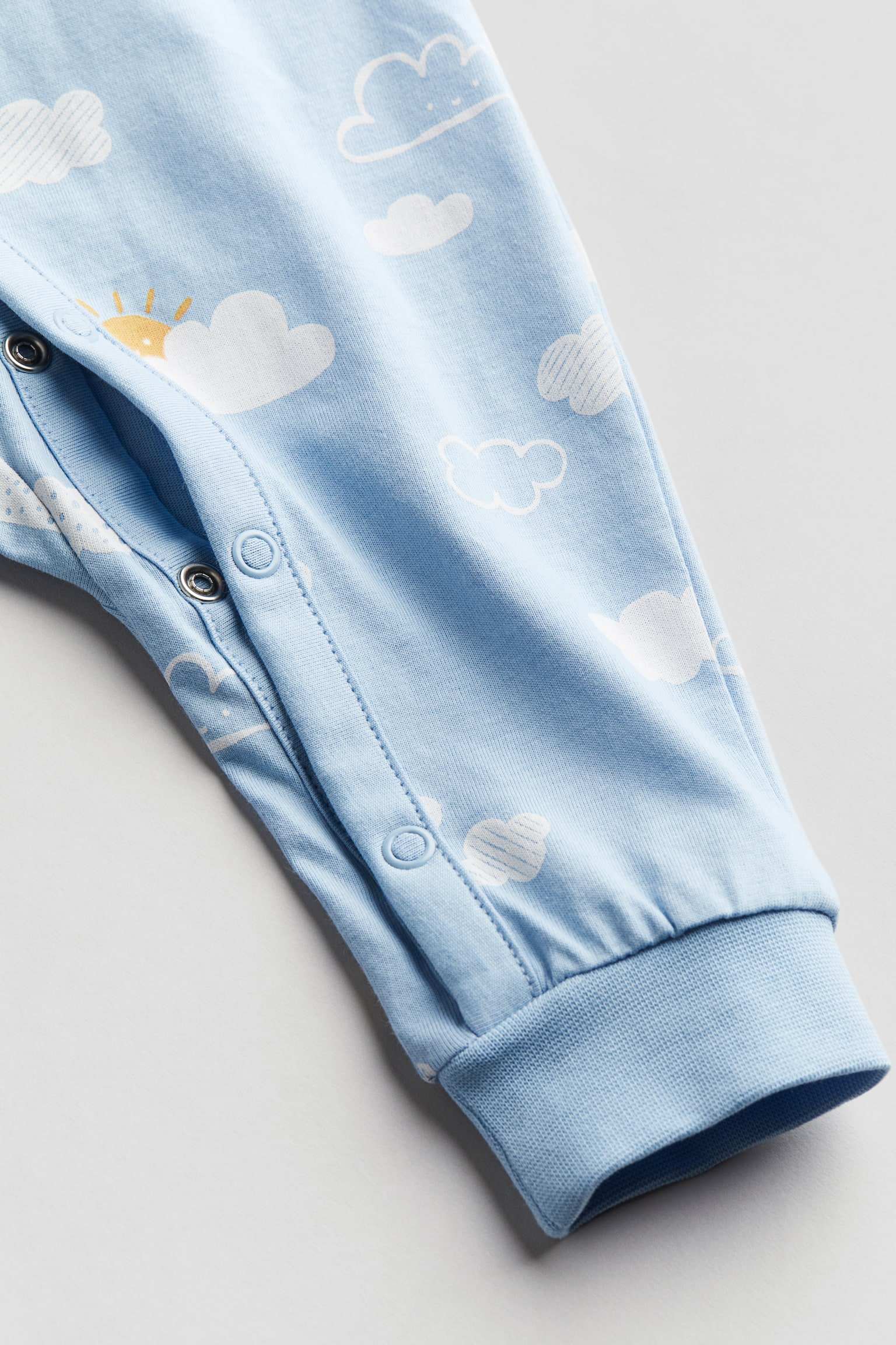 Pattern Sleepsuit - Light blue/Clouds/Light pink/Butterflies/White/Giraffes/Cream/Dinosaurs/Light beige/Cats - 2