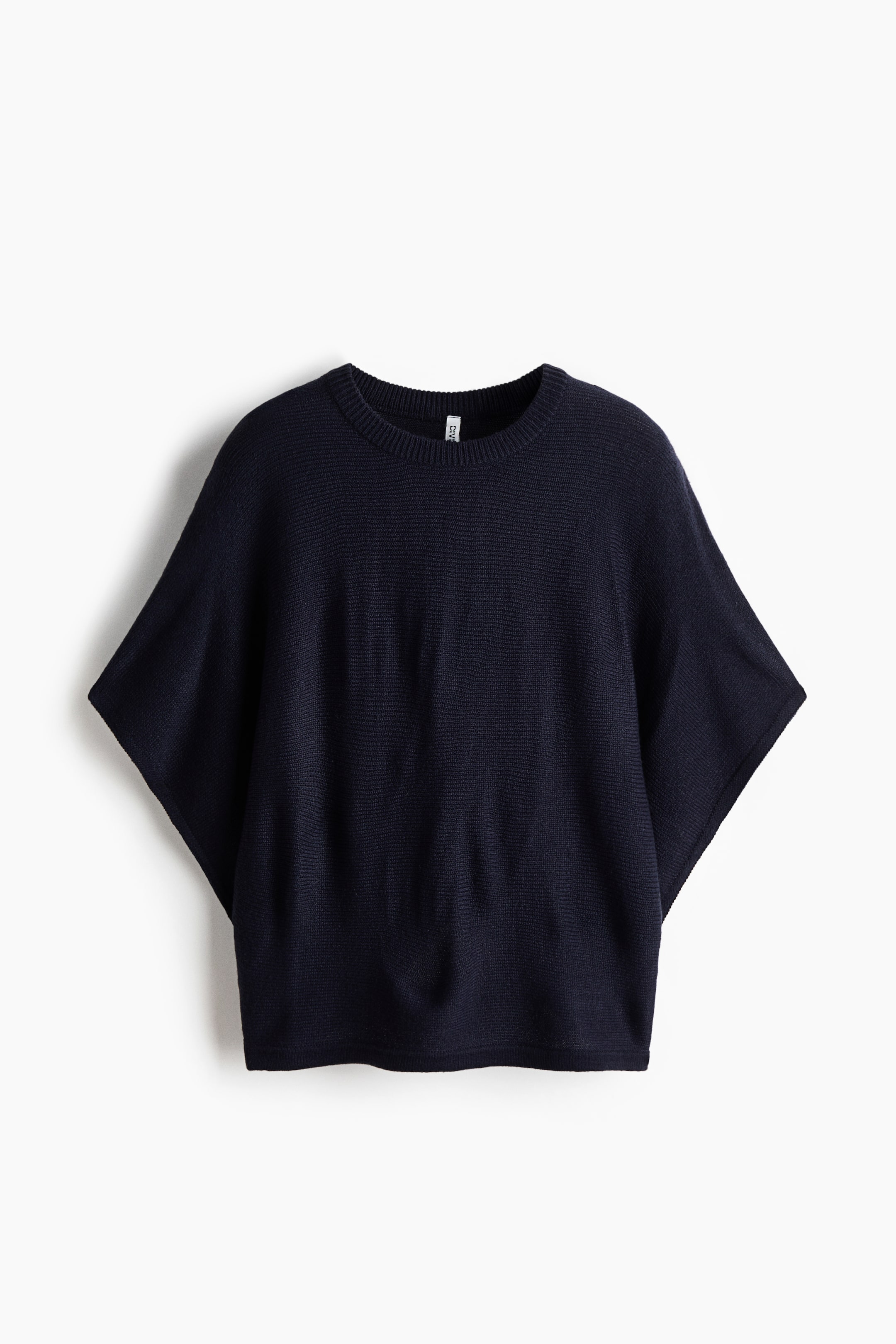 View larger image: An oversized dark-blue top is shown from the FRONT, featuring a soft-knit texture with a round, ribbed neckline, 3/4-length batwing sleeves, and narrow trims finishing the cuffs and hem.