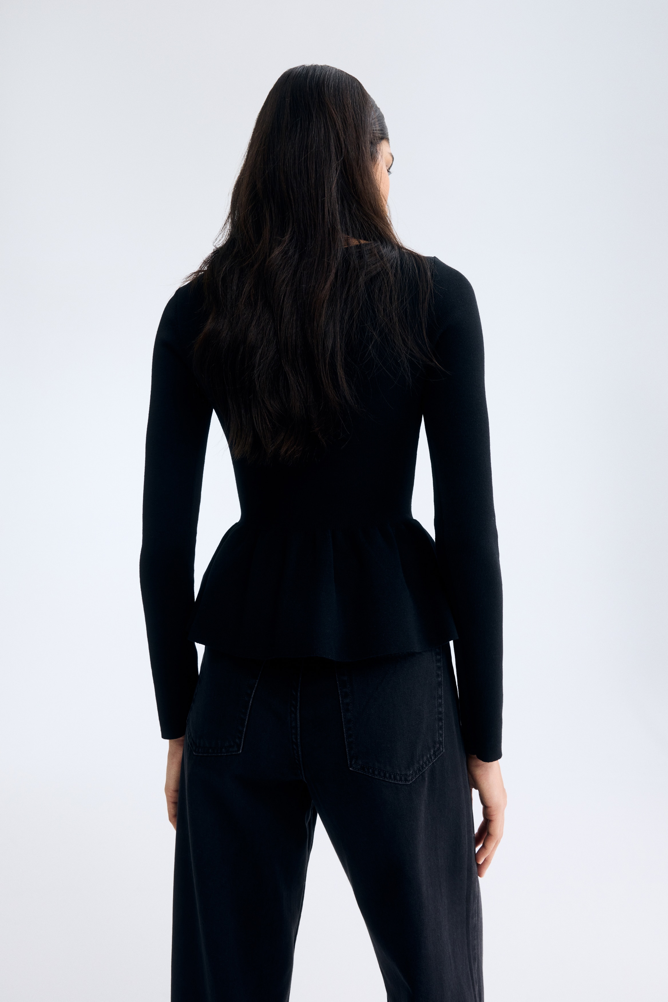 Knitted peplum top