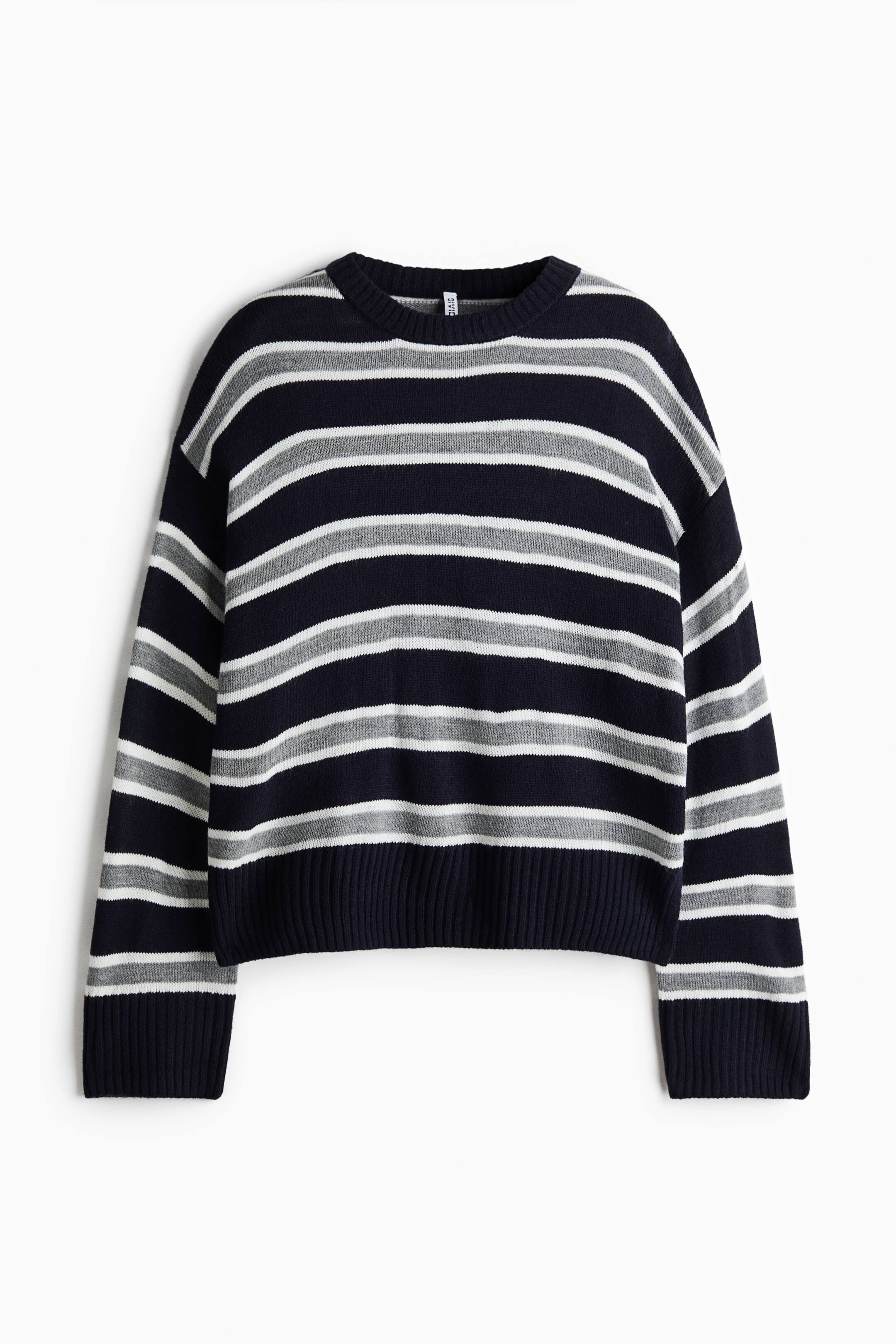 View larger image: A crew neck knit sweater is shown from the front, featuring alternating horizontal stripes in navy blue, grey, and white. The sweater has dropped shoulders, a ribbed neckline, a ribbed hem, and wide ribbed cuffs.