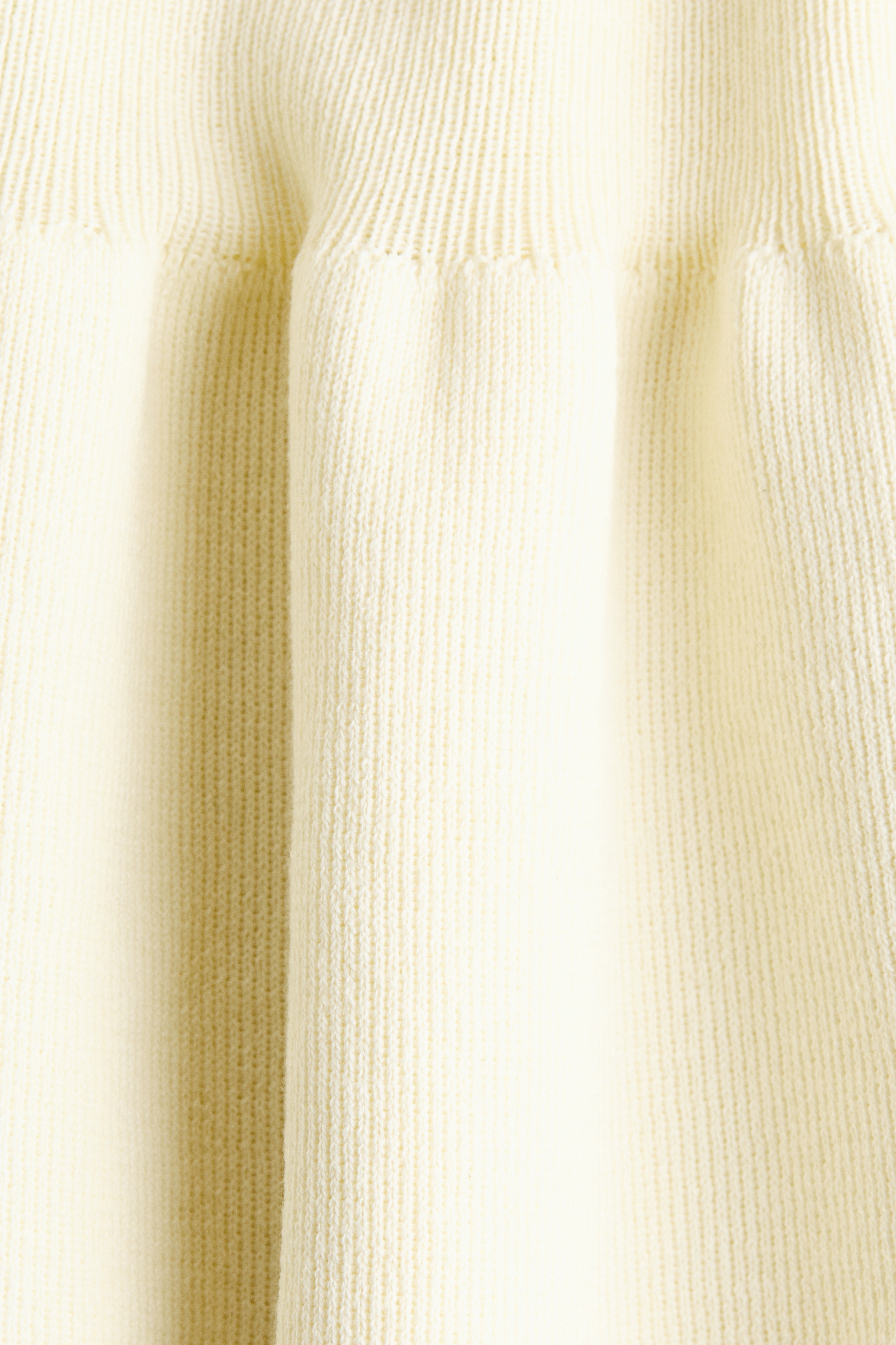Knitted peplum top