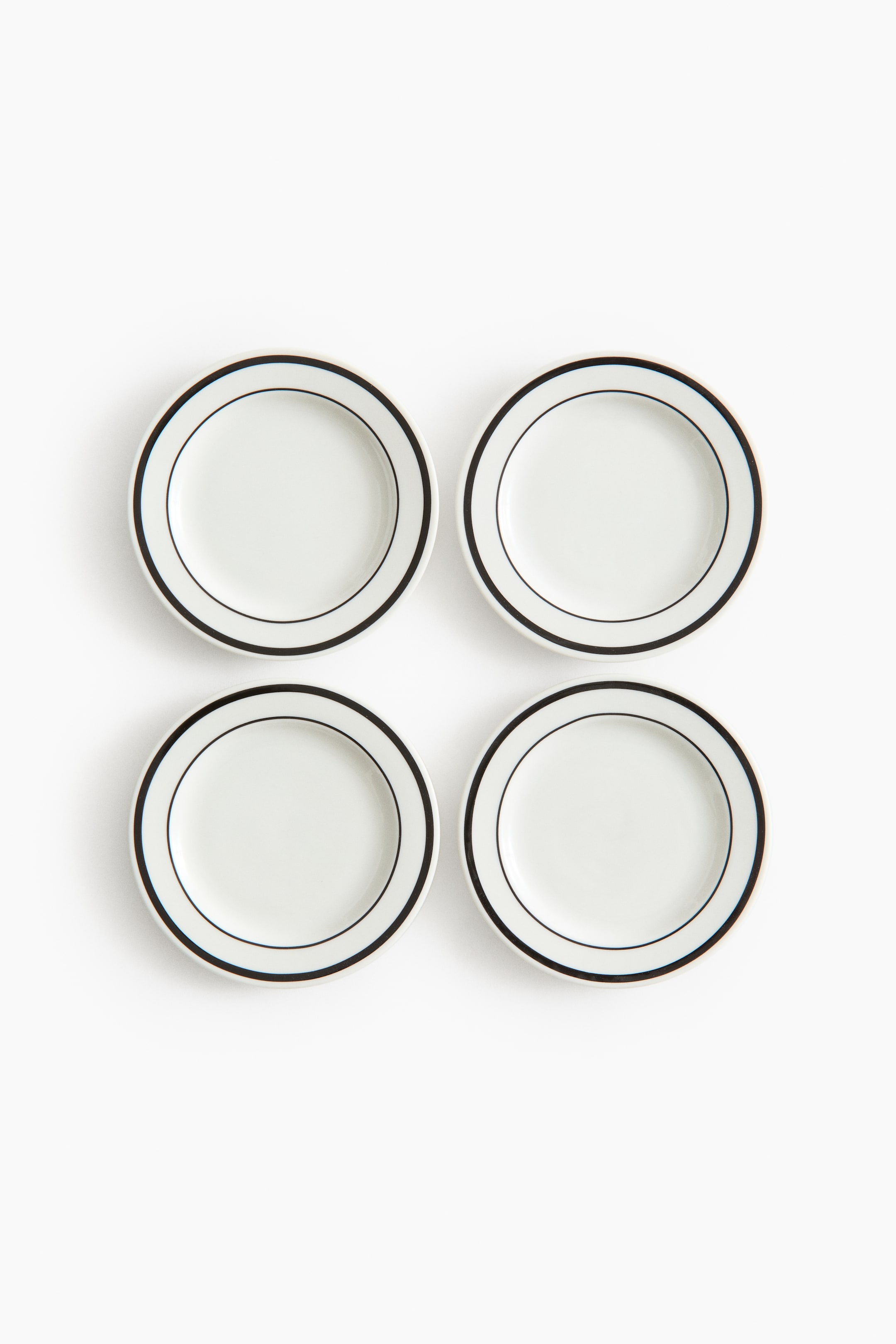 Ver imagen más grande: Pack de 4 platos de porcelana para el pan - Blanco/Negro - HOME | H&M ES 1