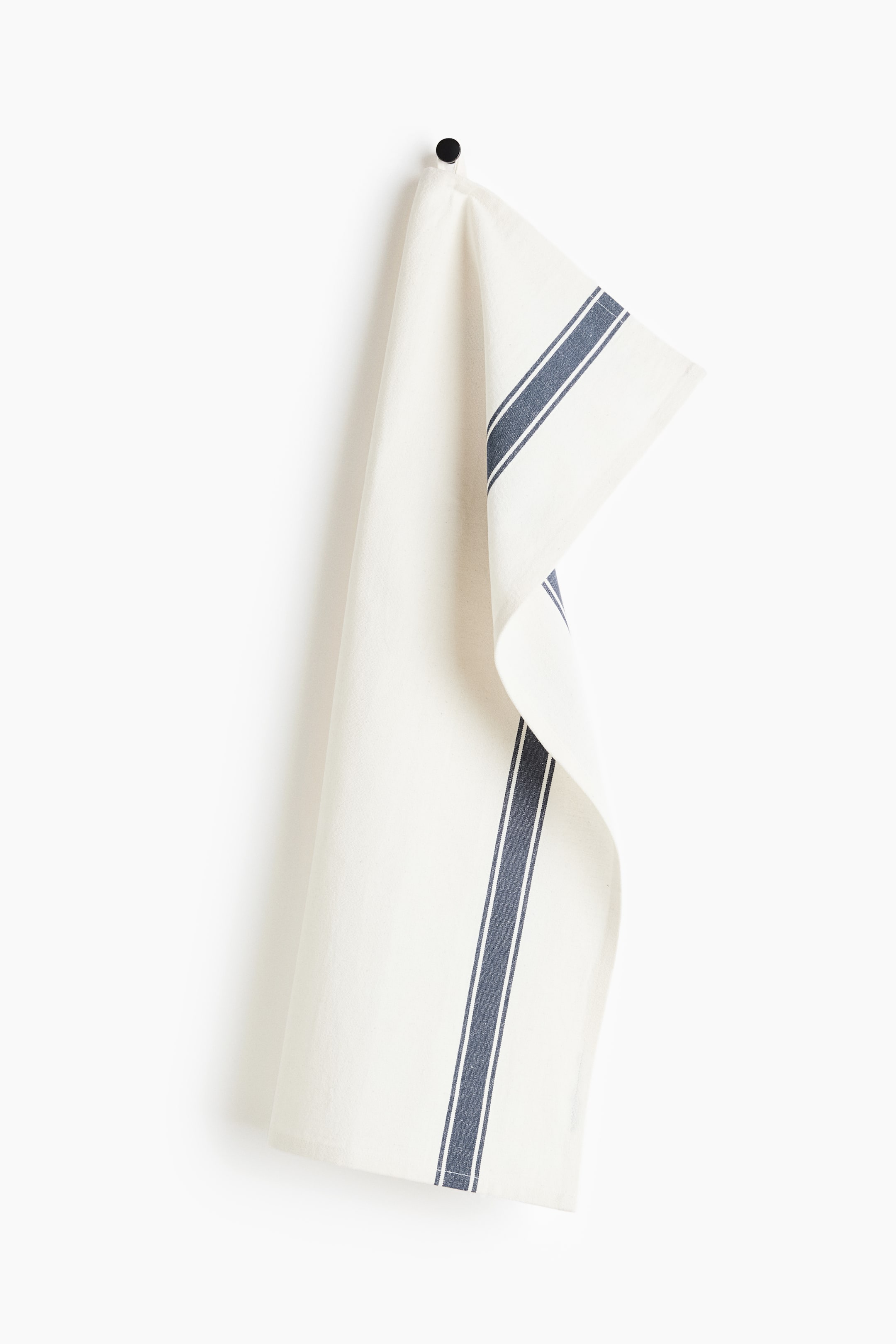 View larger image: The off-white towel is gently draped, showcasing two distinct vertical dark blue multi-line stripe patterns.