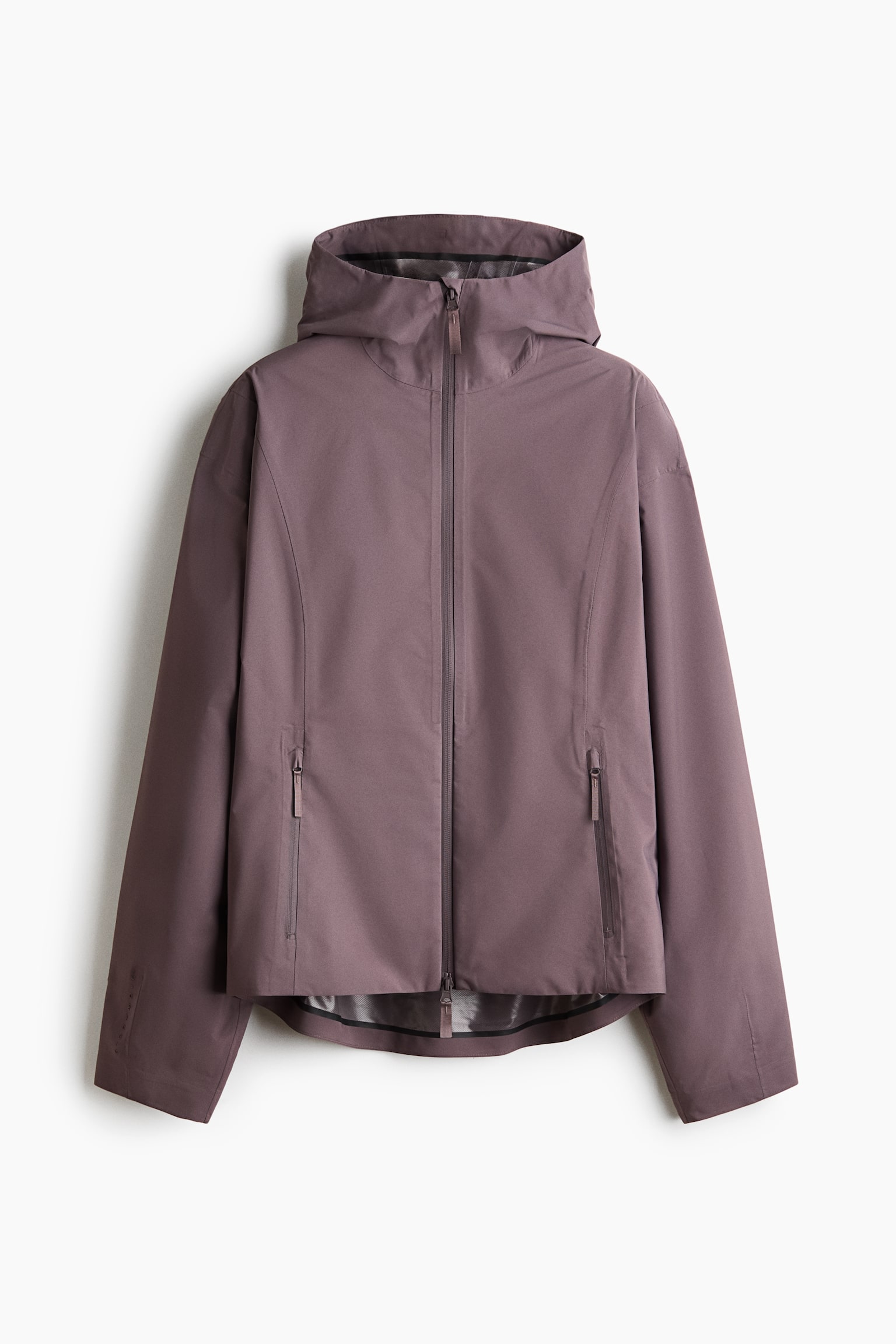 A mauve jacket is facing forward, showcasing a smooth texture, a full-length front zip, an attached hood with a high collar, and two angled zipped pockets. It also features a slightly dropped back hem. - 1