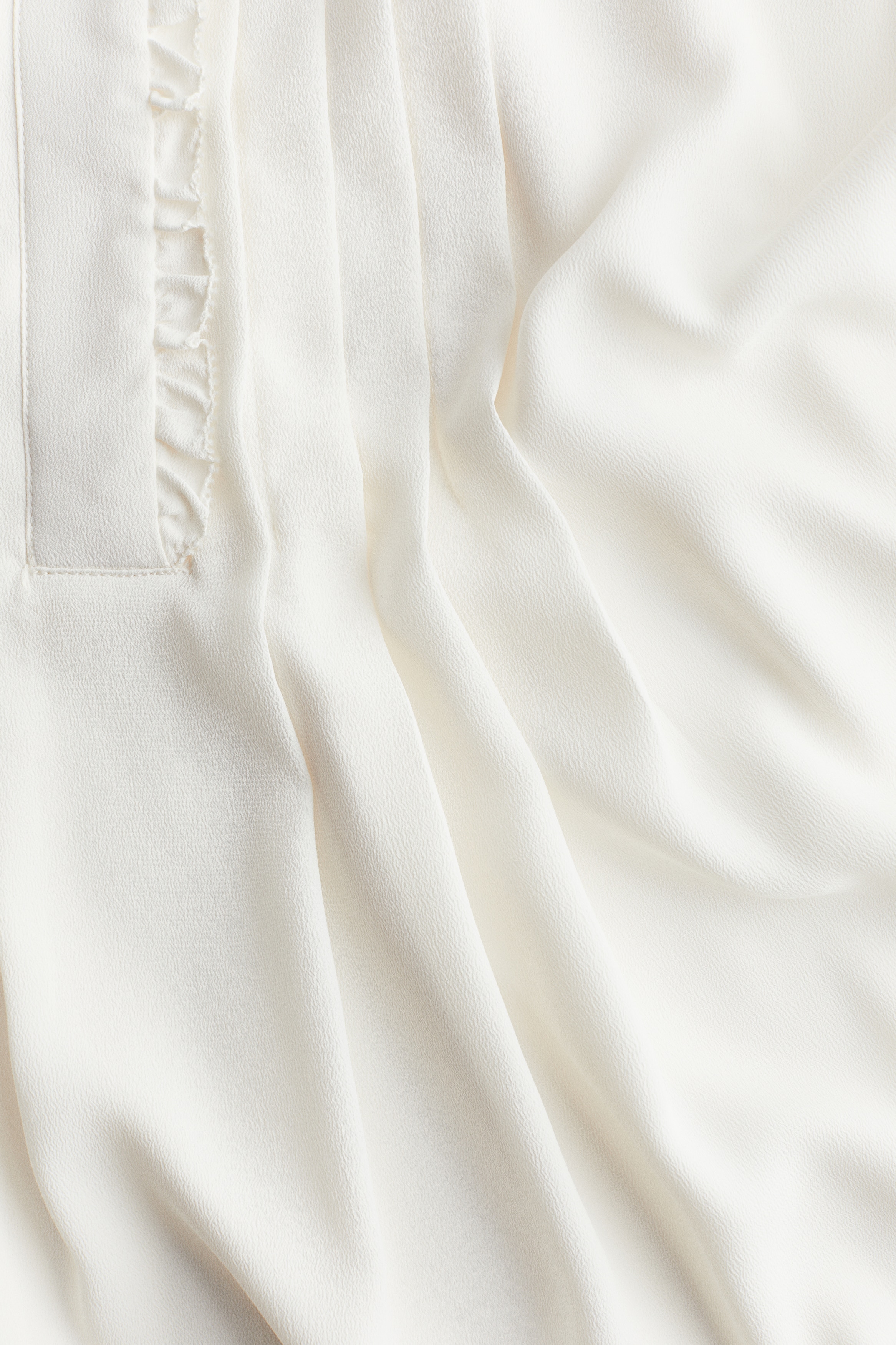 Frill-trimmed blouse