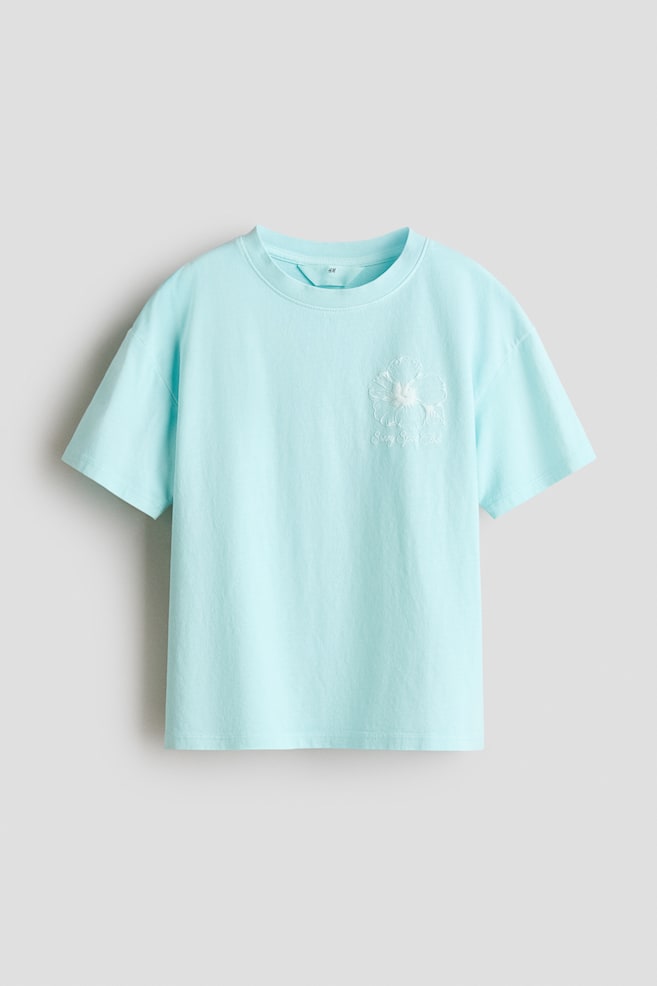 Bedrucktes Baumwoll-T-Shirt - Helltürkis/Ibiza Beach/Marineblau/New York/Weiss/Teddybär/Hellgraumeliert/Paris/Rosa/Salty Ocean - 1