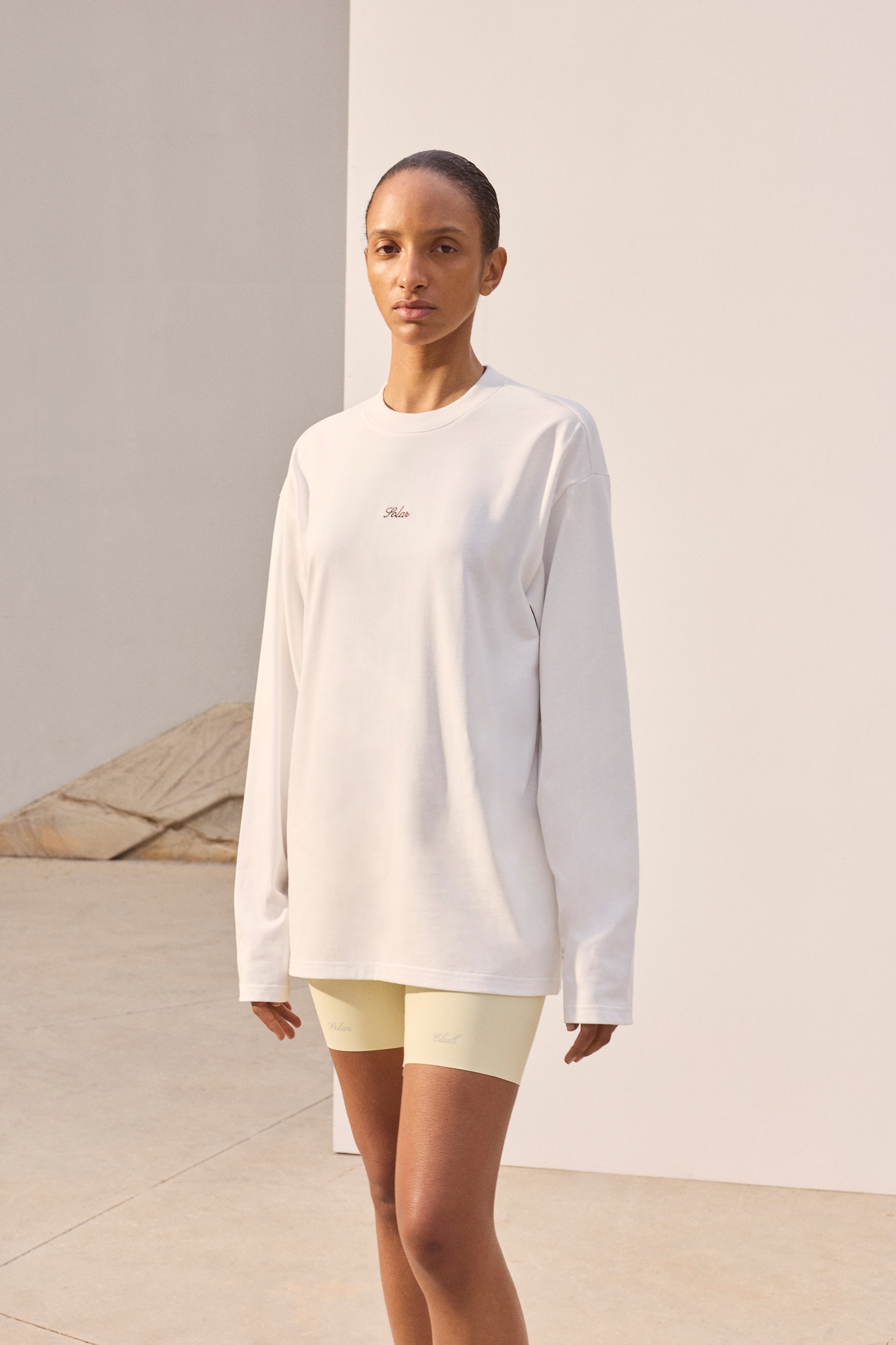 View larger image: Loose Fit Long-sleeved printed sports T-shirt - White/Solar Soleil - Ladies | H&M 1