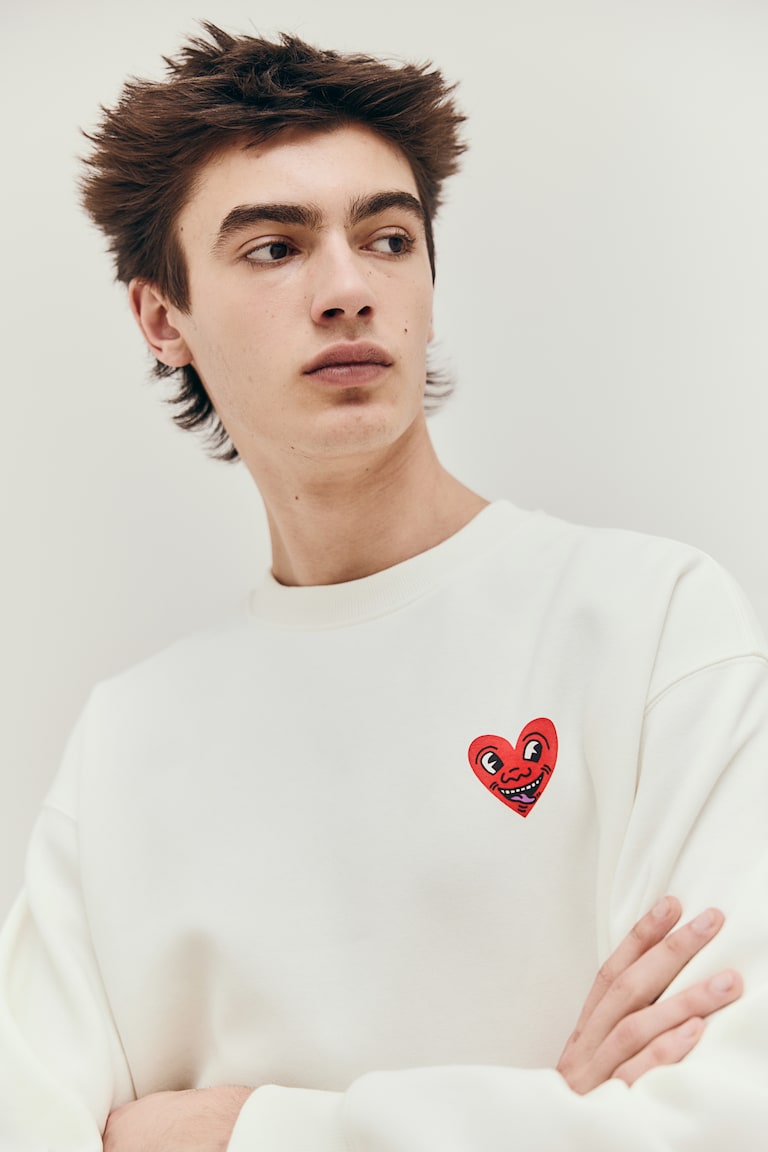 Sweatshirt in Loose Fit Cremefarben/Keith Haring HERREN H&M CH