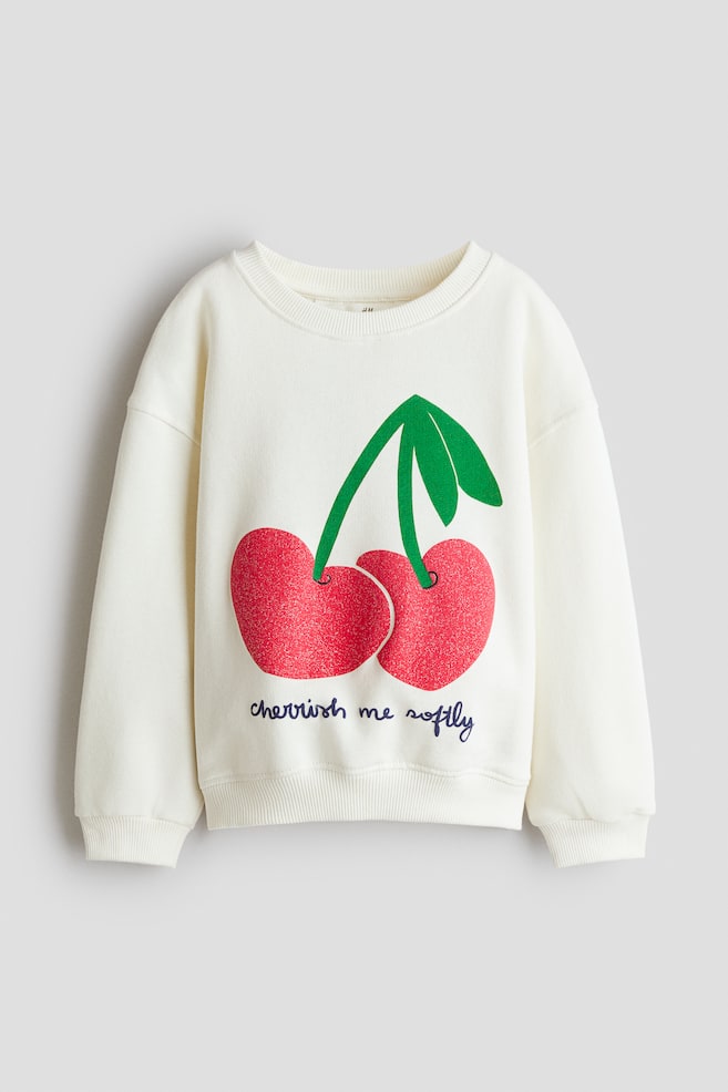 Sweatshirt mit Motivdetail - Weiß/Kirschen/Elfenbein/Sterne/Helltürkis/Paris/Elfenbein/Milan/Puderrosa/Teddybär/Graubraunmeliert/Pegasus/Hellgraumeliert/Mon Amie/Hellrosa/Erdbeeren/Gelb/Herz/Cremefarben/Hunde/Dunkelbraun/Amour - 1