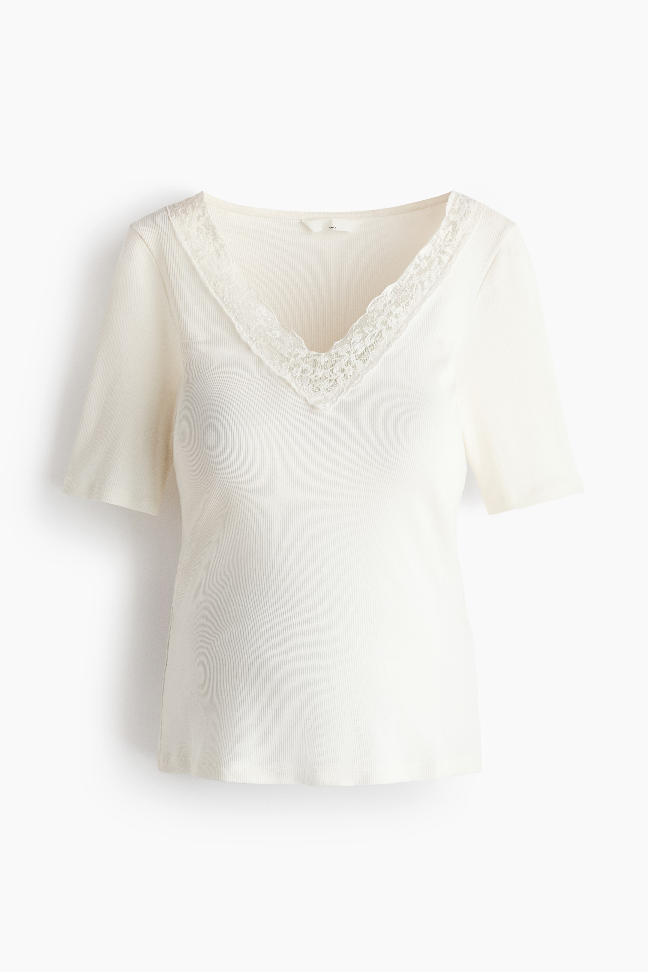 View larger image: The off-white ribbed top features a V-neckline, delicately trimmed with lace along its edges. It is designed with short sleeves and a straight hem.