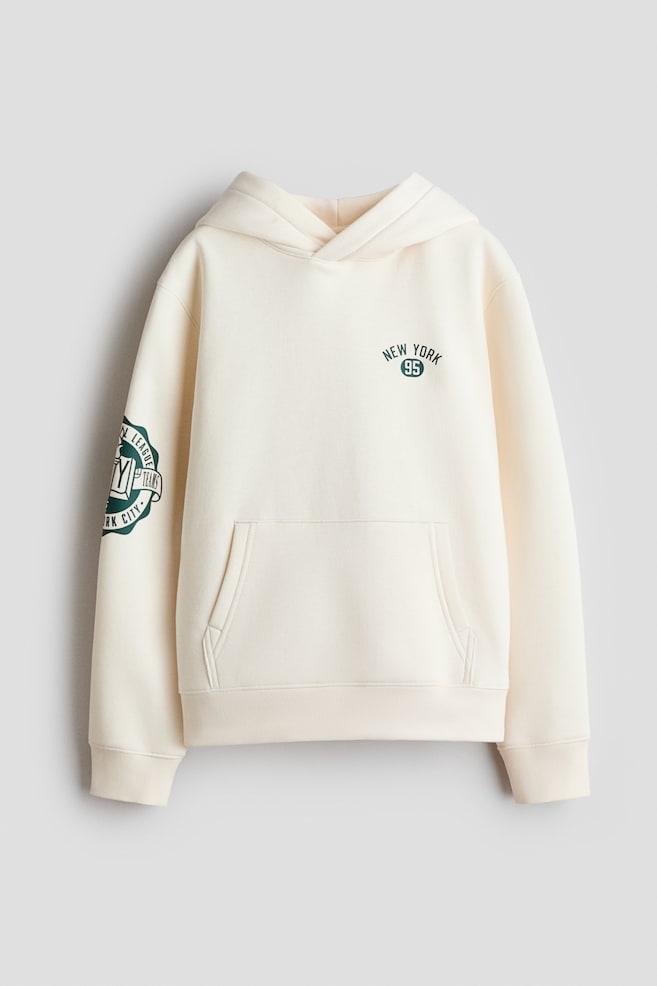 Sweatshirt de capuz com motivo e interior cardado - Creme/New York/Vermelho/East Coast skate/Turquesa/Everyday classic/Lilás ameixa/New York City/Cinzento claro/Athletic dept./Castanho escuro/Worldwide/Cinzento mesclado/New York - 1