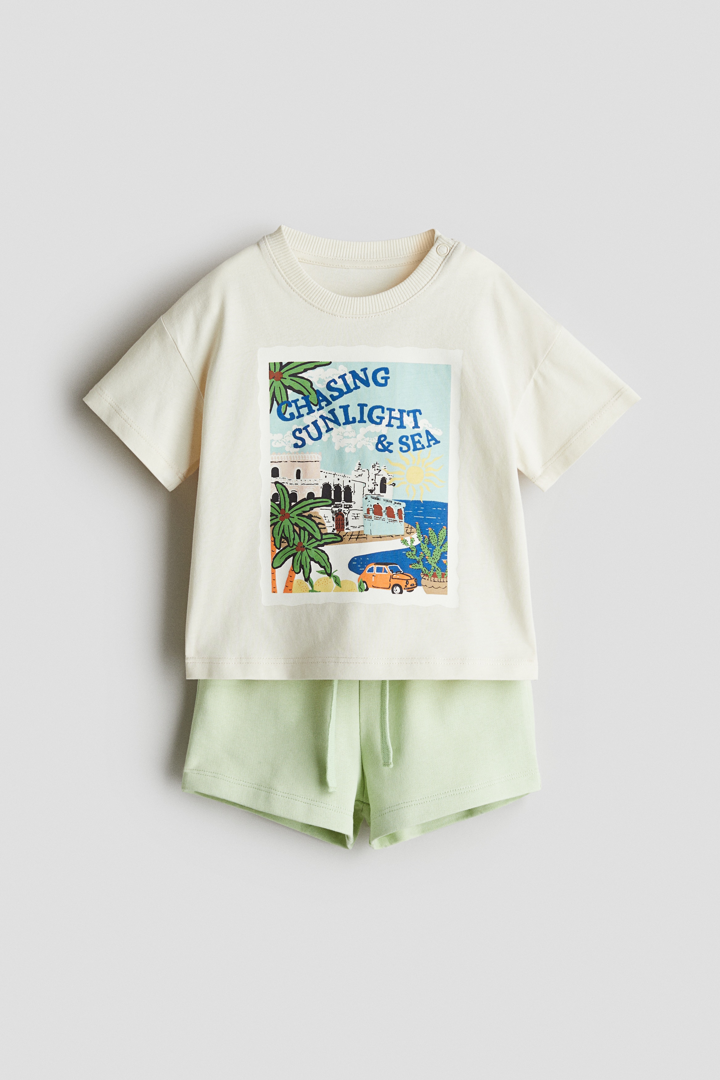 Σετ 2 τεμαχίων με T-shirt και σορτς - Μπεζ/Chasing Sunlight/Τιρκουάζ/δεινόσαυροι