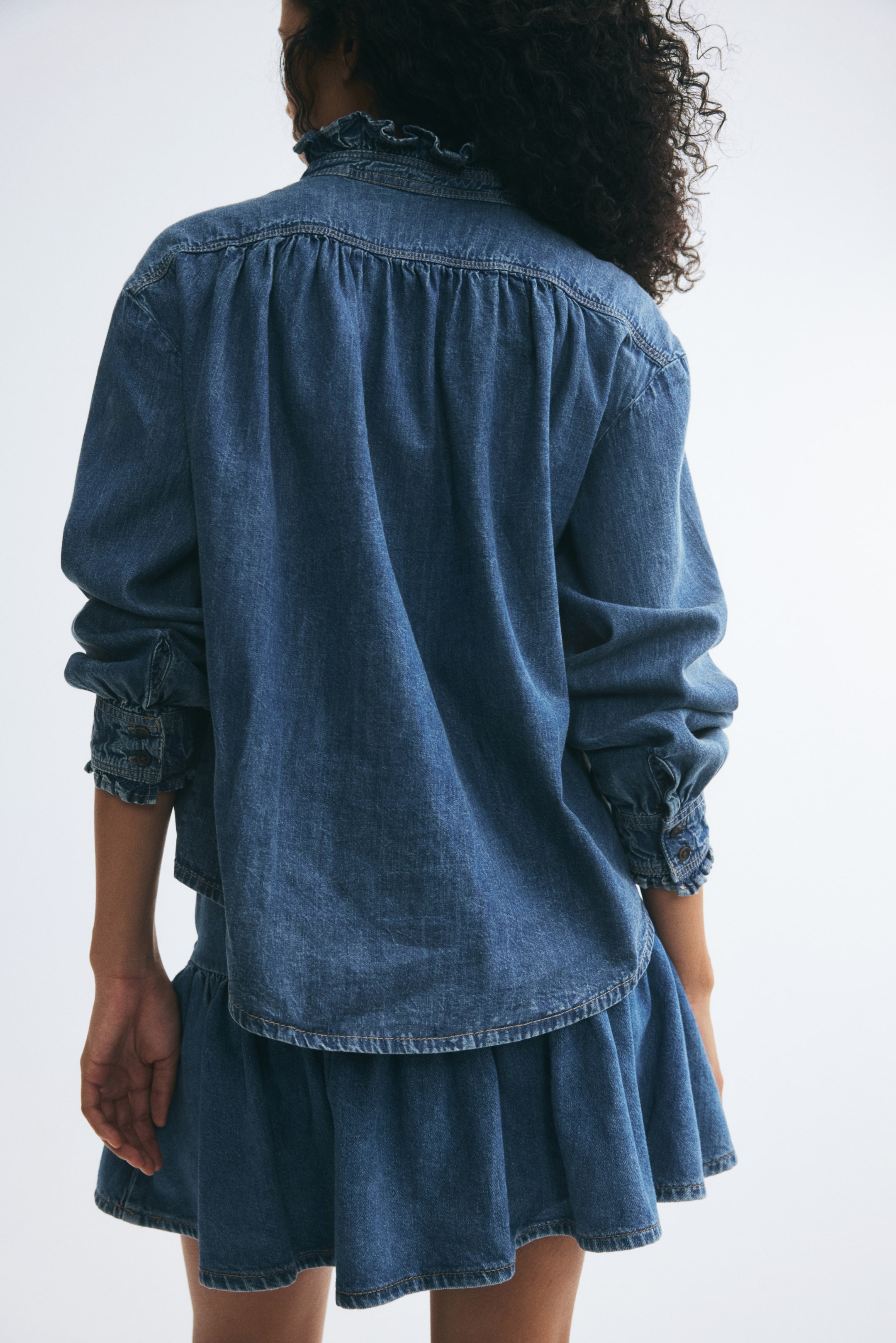 Blouse à volants plissés
