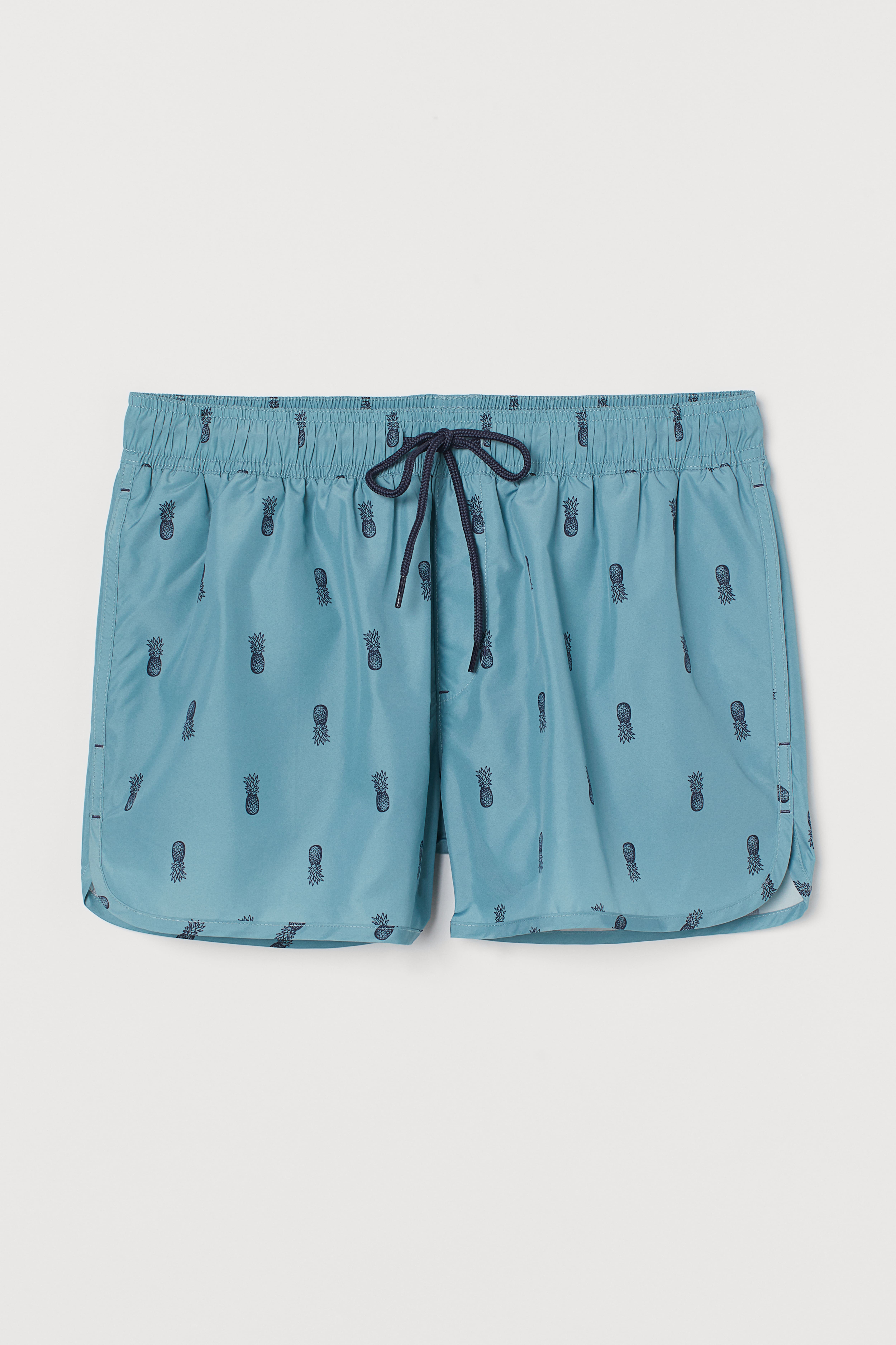 Short patterned swim shorts