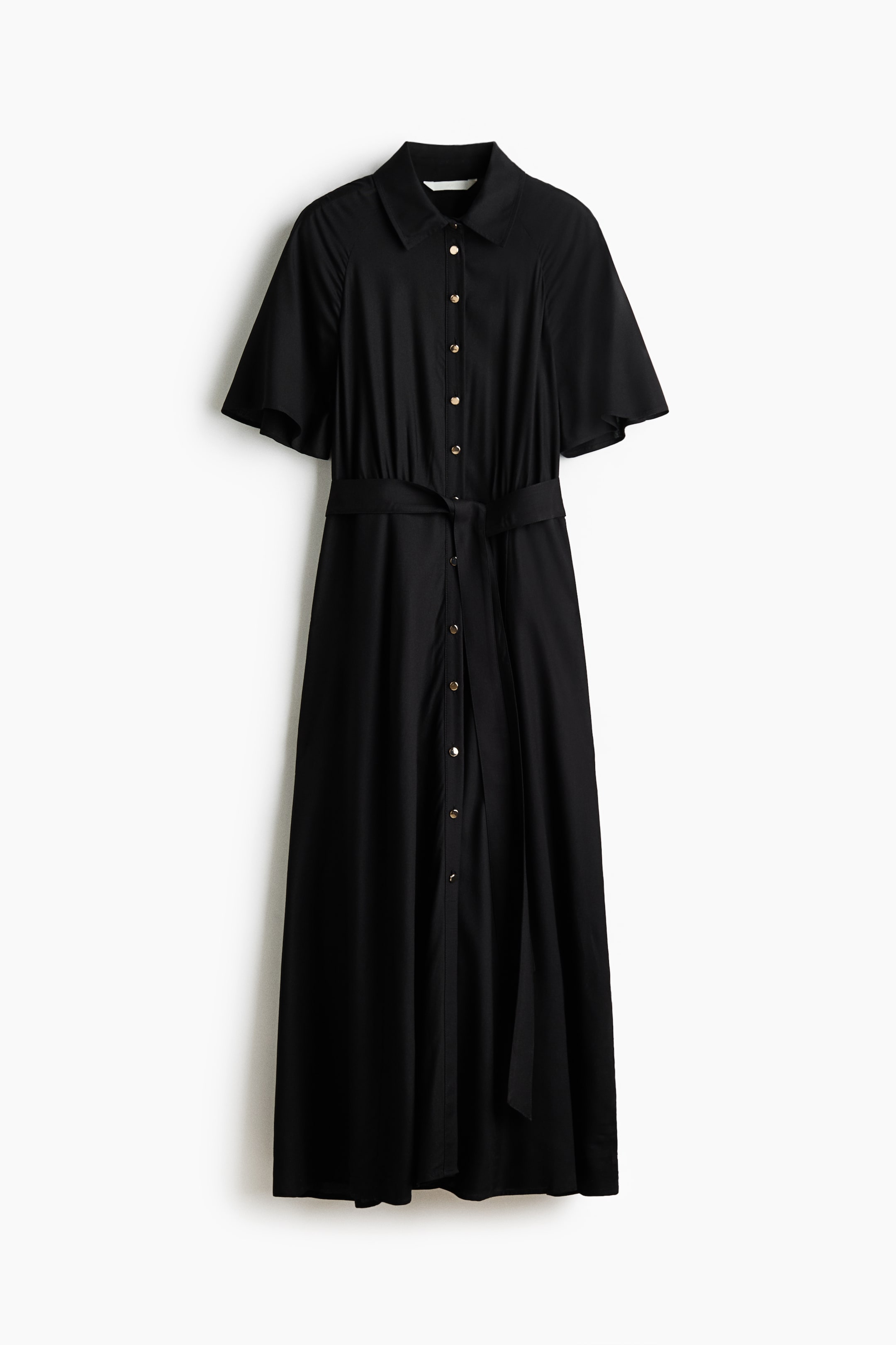 View larger image: A black calf-length dress is shown from the front, featuring a collar, buttons down the front with gold-toned hardware, and short raglan sleeves. The front waist is gathered, and a detachable tie belt cinches it.