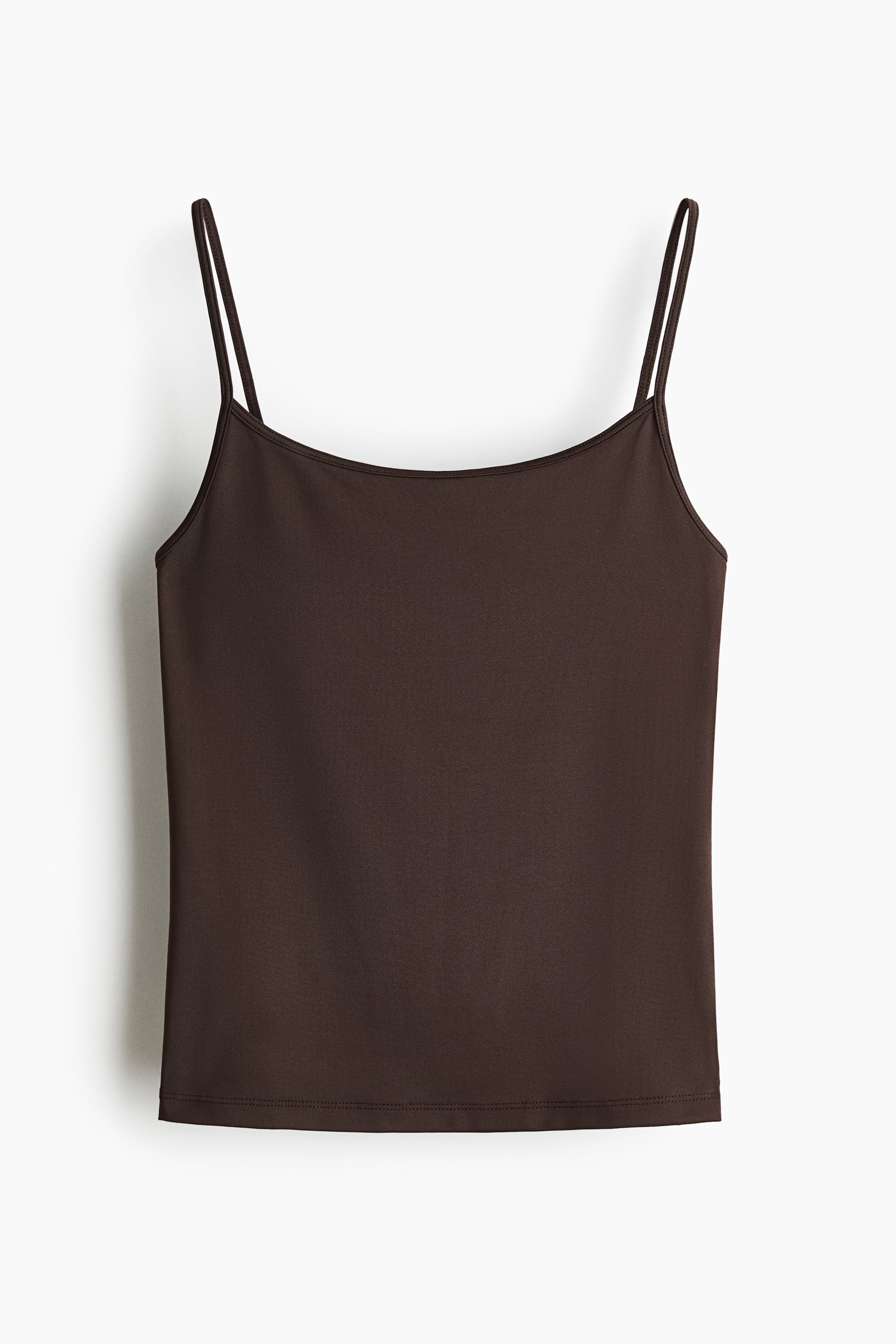 Größeres Bild ansehen: Ein dunkelbraunes, eng anliegendes Oberteil aus Stretch-Jersey zeigt seine Vorderseite, mit einem Rundhalsausschnitt und schmalen Schulterträgern.