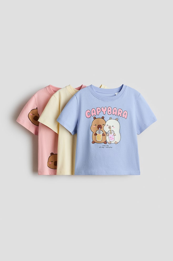 3-pack Printed Jersey Tops - Light blue/CapyFun/Light blue/Hello Kitty/Beige/Lilo & Stitch/Pale purple/CapyFun/Yellow/Minnie Mouse/Light pink/KPop Demon Hunters/Light pink/PAW Patrol/Light blue/Lilo & Stitch/Pink/Lilo & Stitch/Light pink/Hello Kitty/Cream/Frozen/Light dusty blue/Minnie Mouse - 1