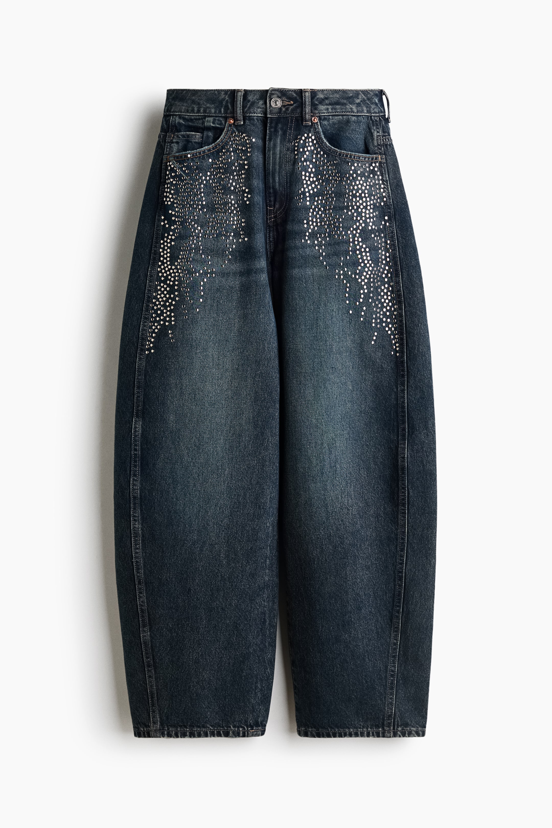 View larger image: These high-waisted, dark-wash denim jeans are shown from the front, featuring curved, voluminous legs that taper toward the hems. They are embellished with cascading silver rhinestones extending from the front pockets down the upper thighs, highlighting a classic five-pocket design with a button closure.
