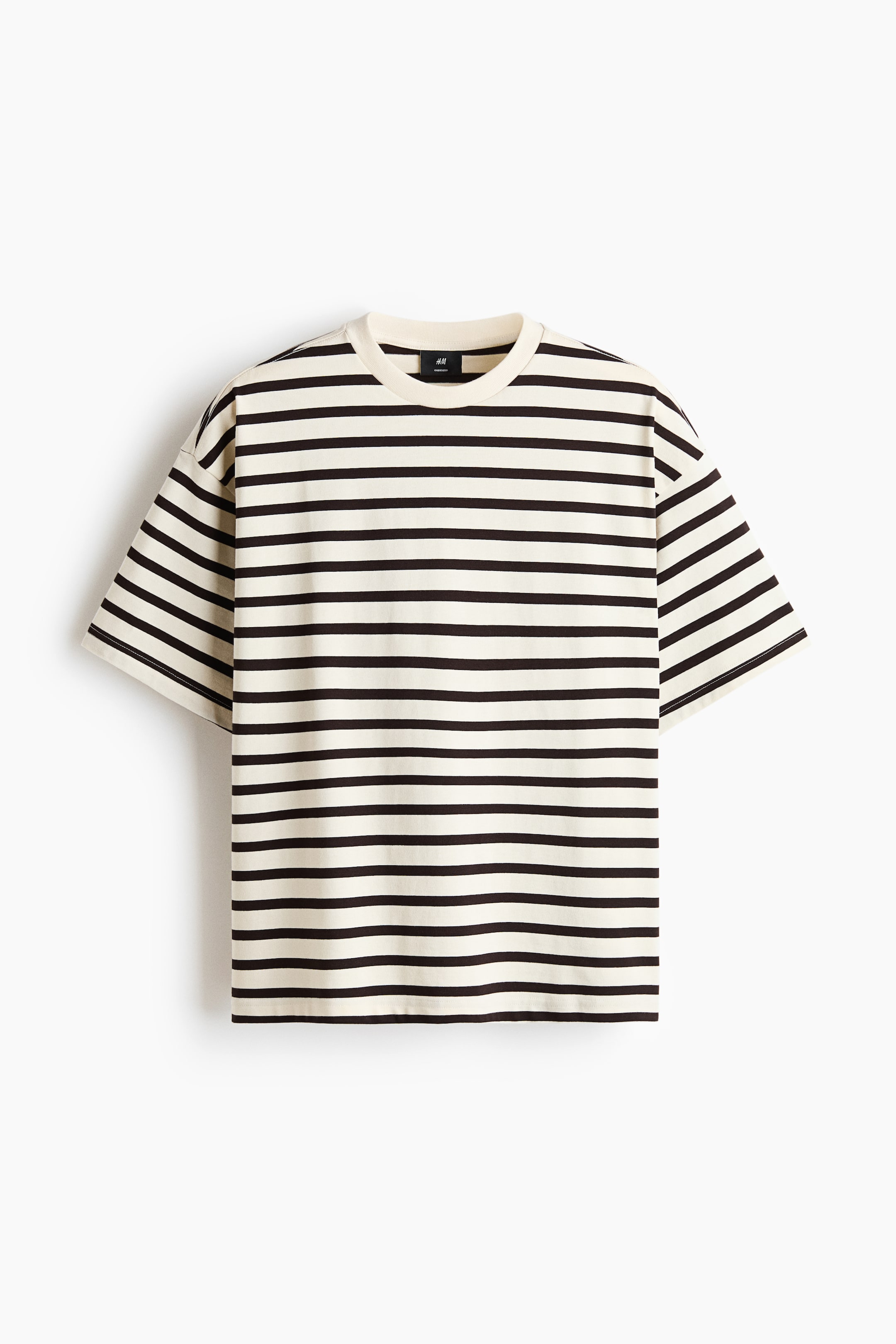 View larger image: A boxy-style t-shirt made from cotton jersey offers an oversized fit for a baggy, extra-loose silhouette, with cream and dark horizontal stripes across the front. It features a round, ribbed neckline, dropped shoulders, and a straight-cut hem.