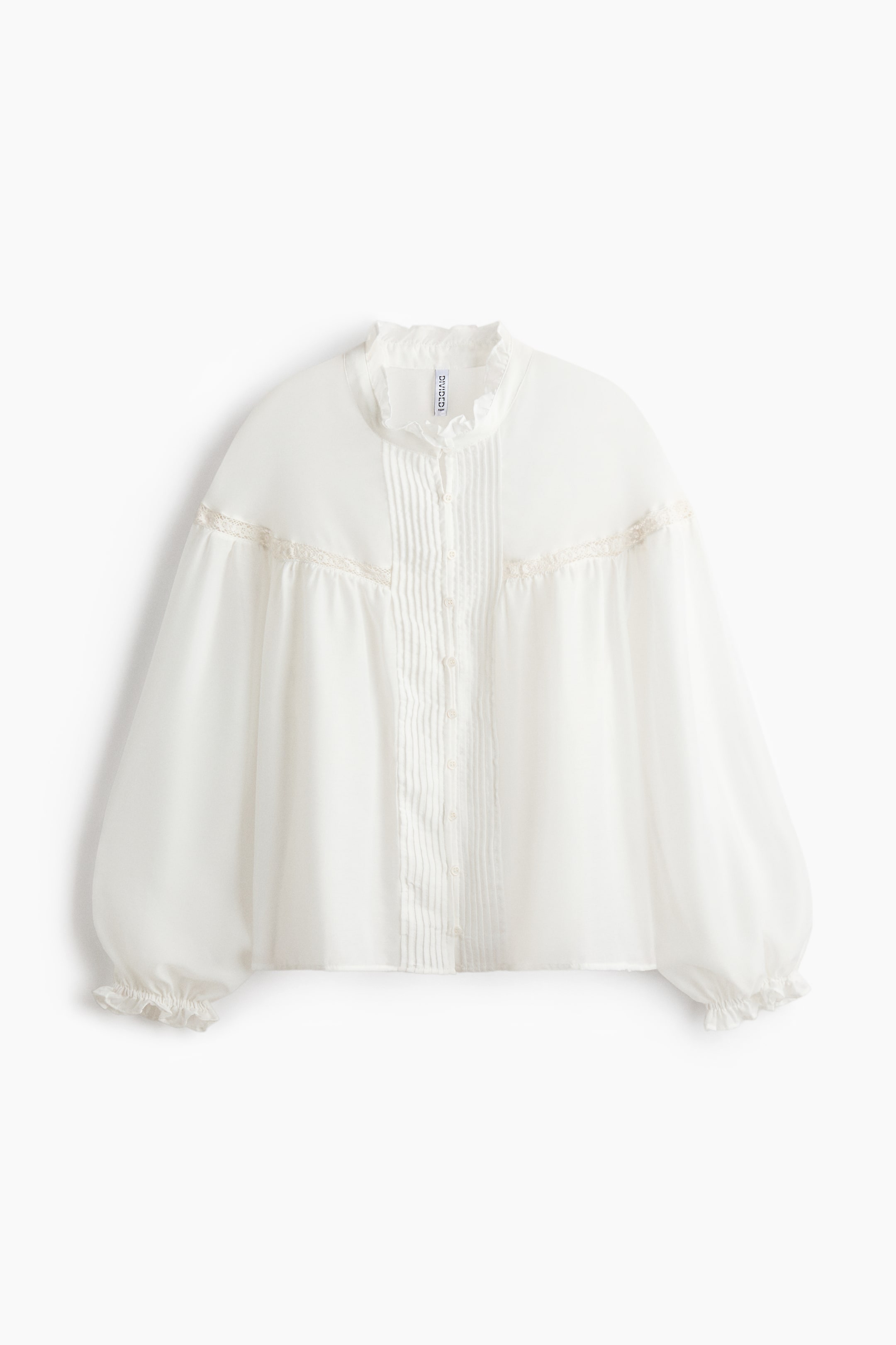 Blouse à volants avec manches ballon