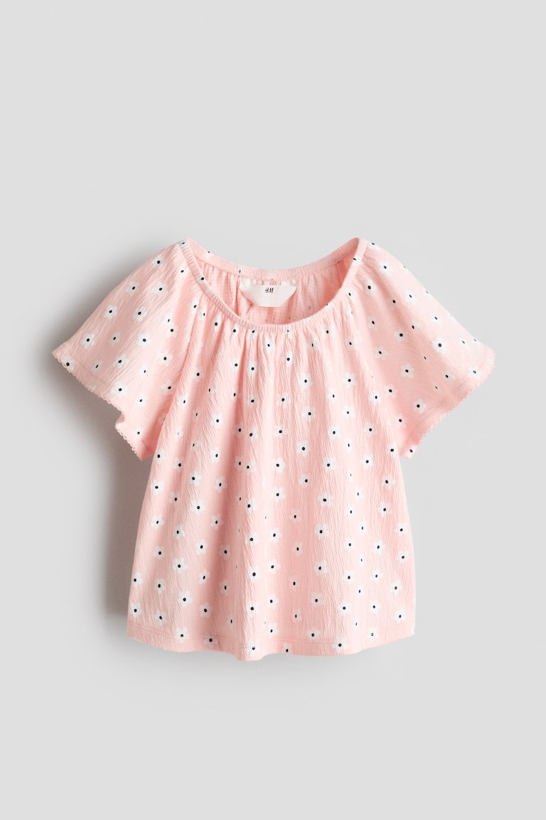 Dezenirana bluza od krep tkanine