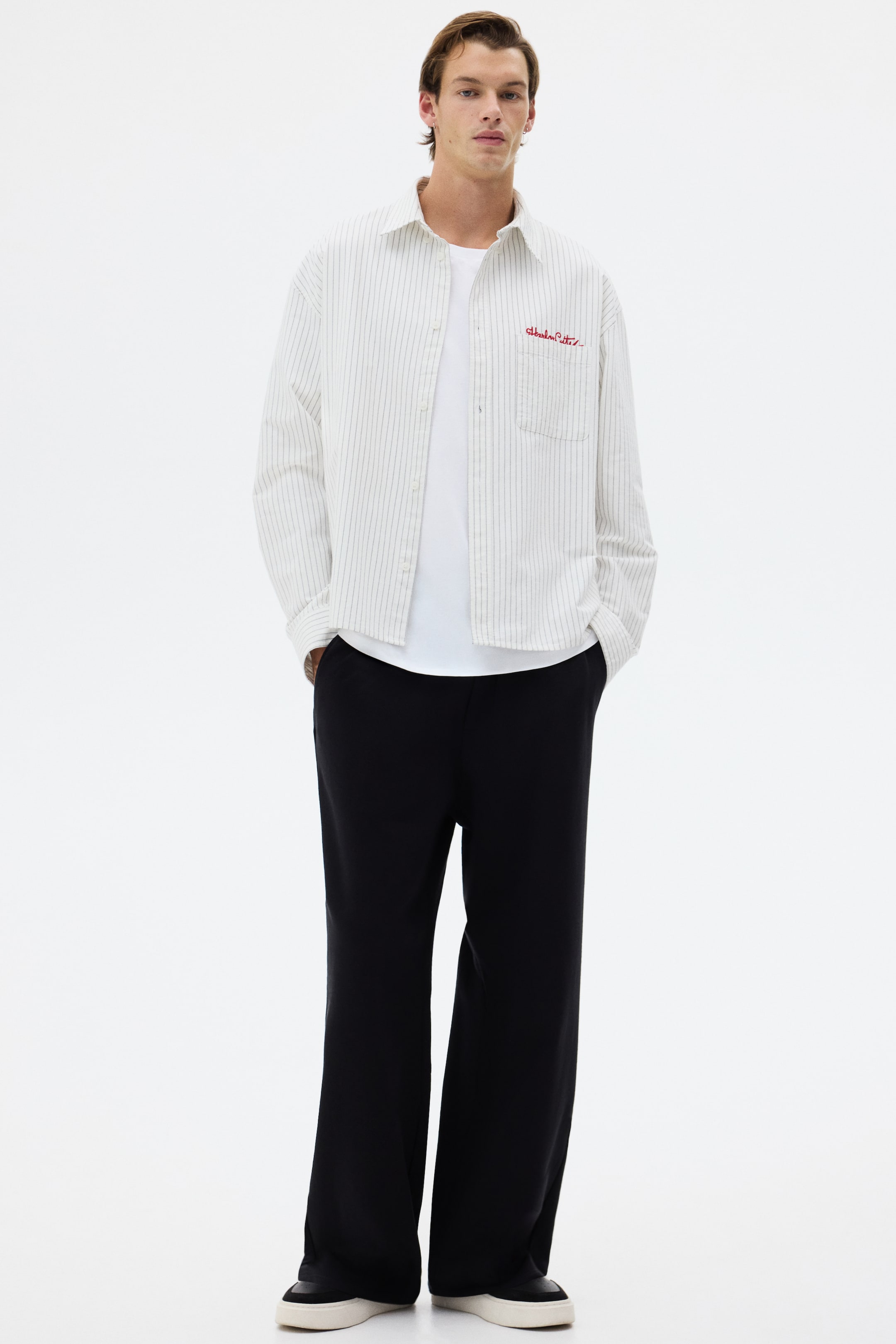 Vezi imaginea mai mare: Pantaloni tip jogging largi de bumbac - Negru - BĂRBAŢI | H&M RO 1