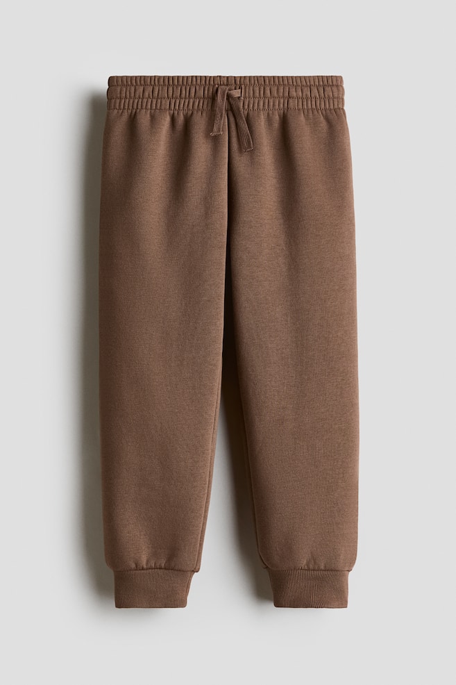 Joggers con interior cepillado - Topo/Verde oscuro/Azul marino/Gris claro jaspeado/Negro/Beige/Rojo oscuro/Rojo/Azul empolvado/Turquesa oscuro/Dinosaurios/Turquesa oscuro - 1